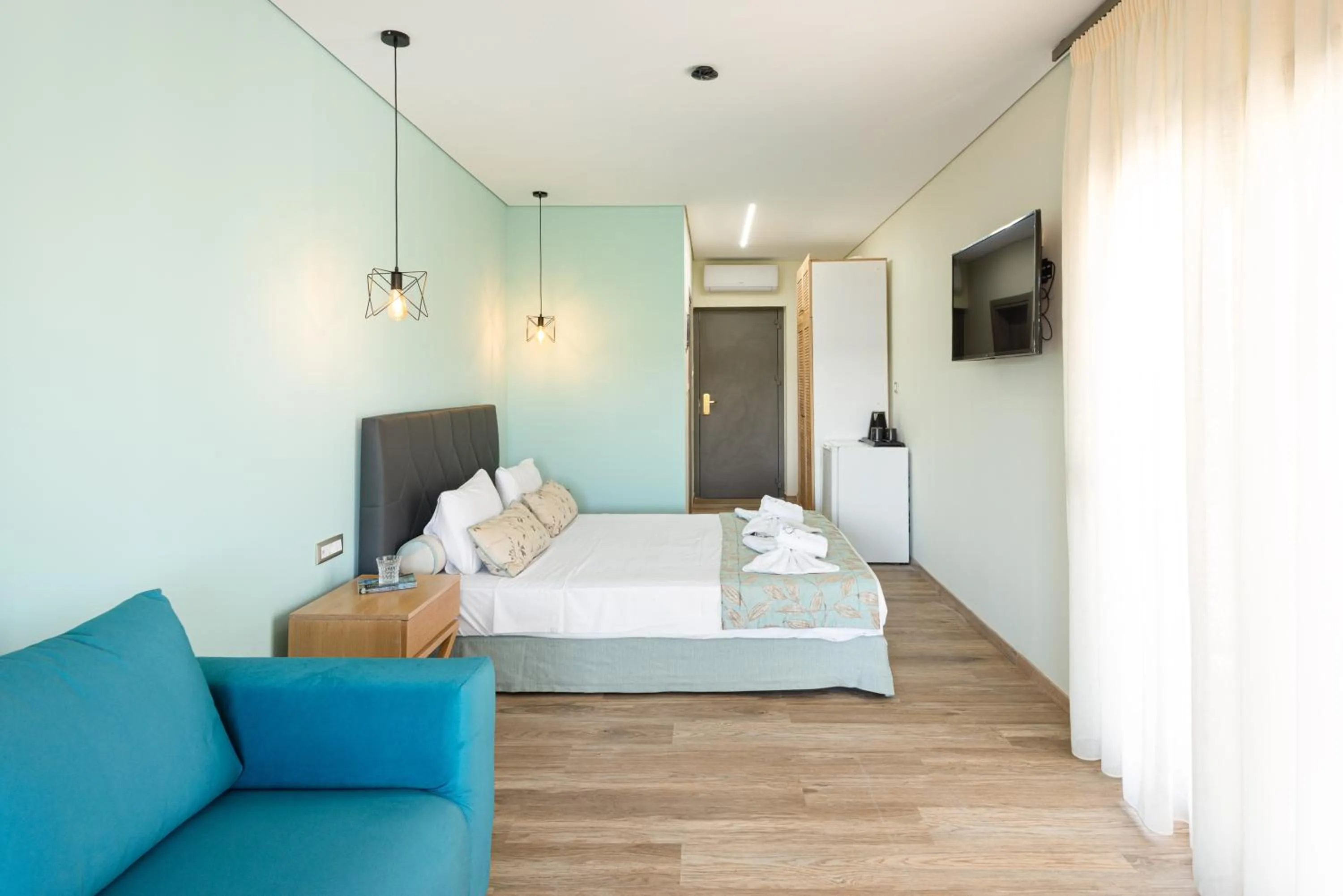 Bed in Regos Resort Hotel