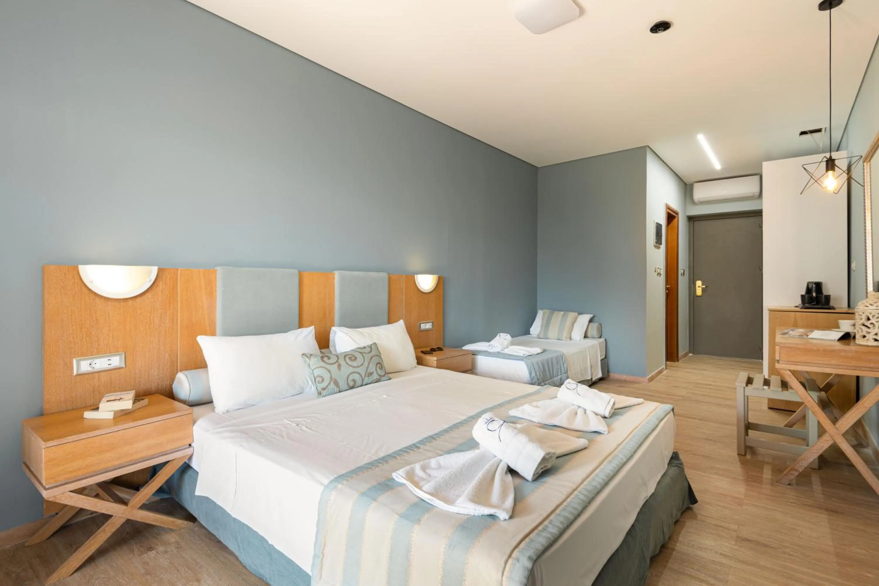 Bedroom, Bed in Regos Resort Hotel