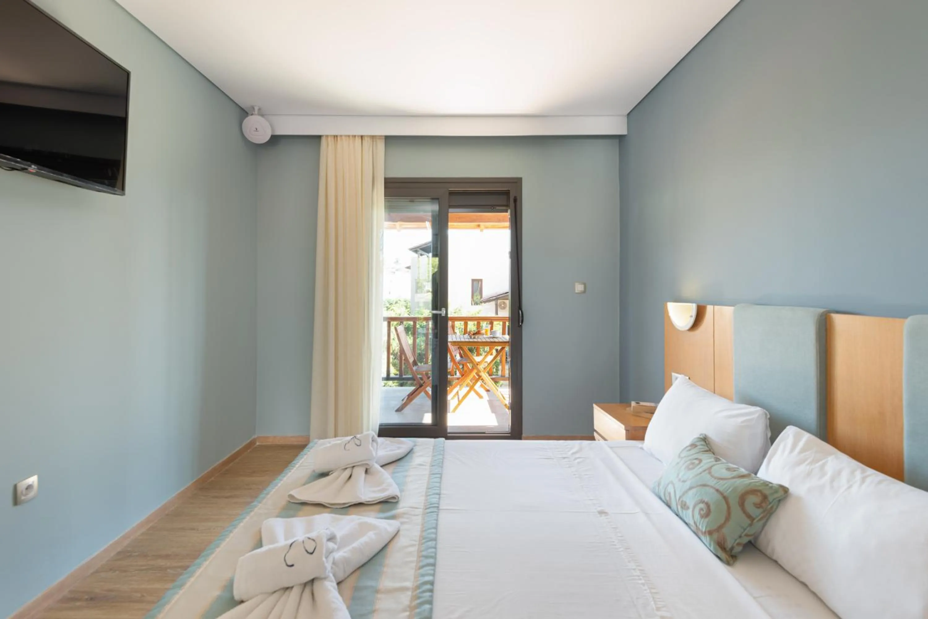 Bed in Regos Resort Hotel