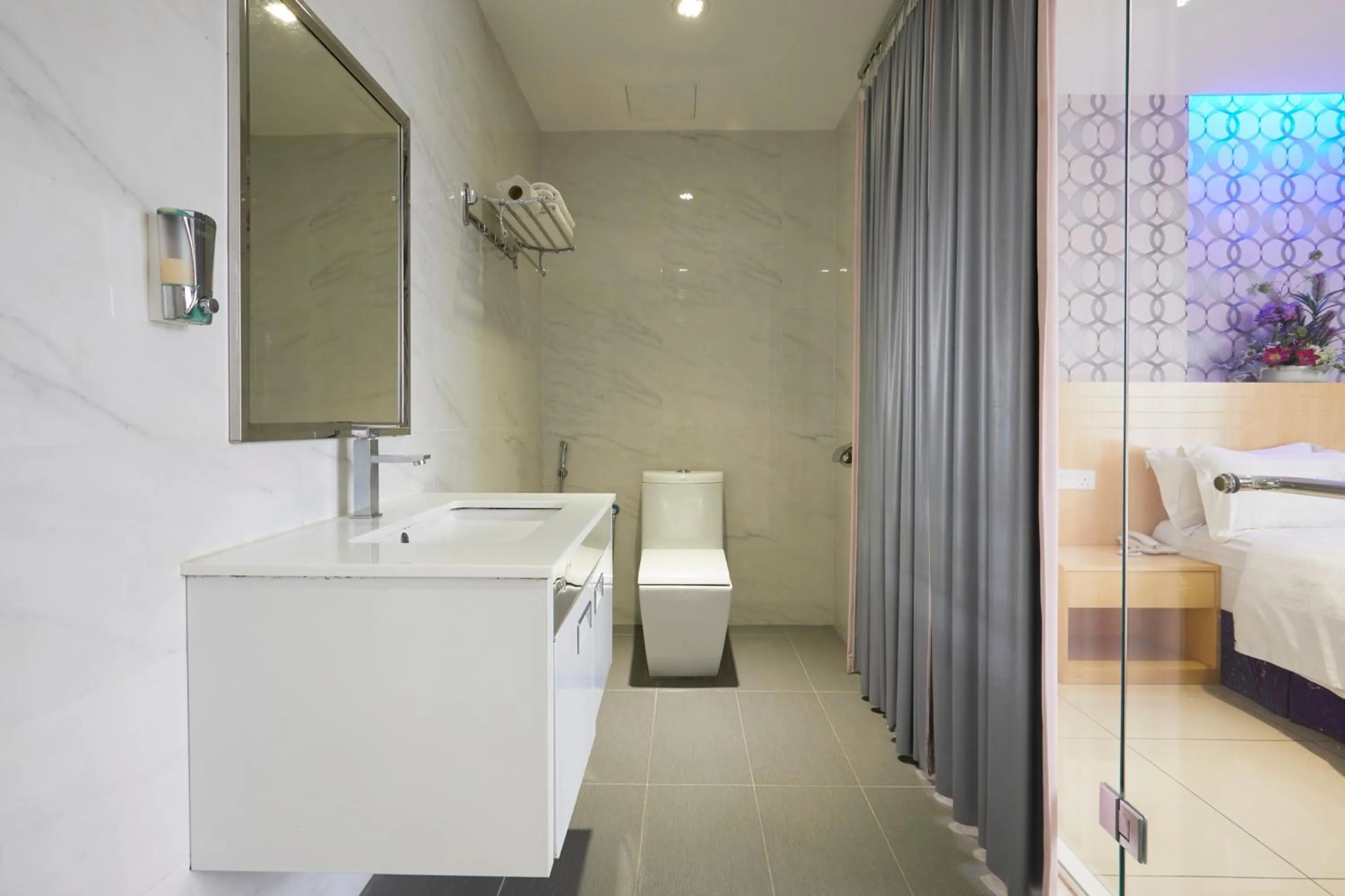 Bathroom, Bed in East Sun Hotel Sekinchan Self Check In