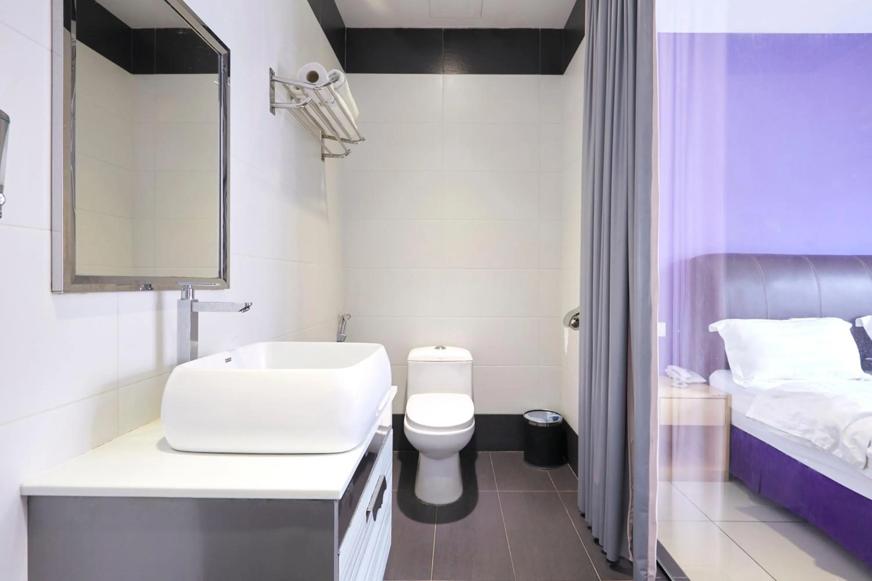 Bathroom, Bed in East Sun Hotel Sekinchan Self Check In