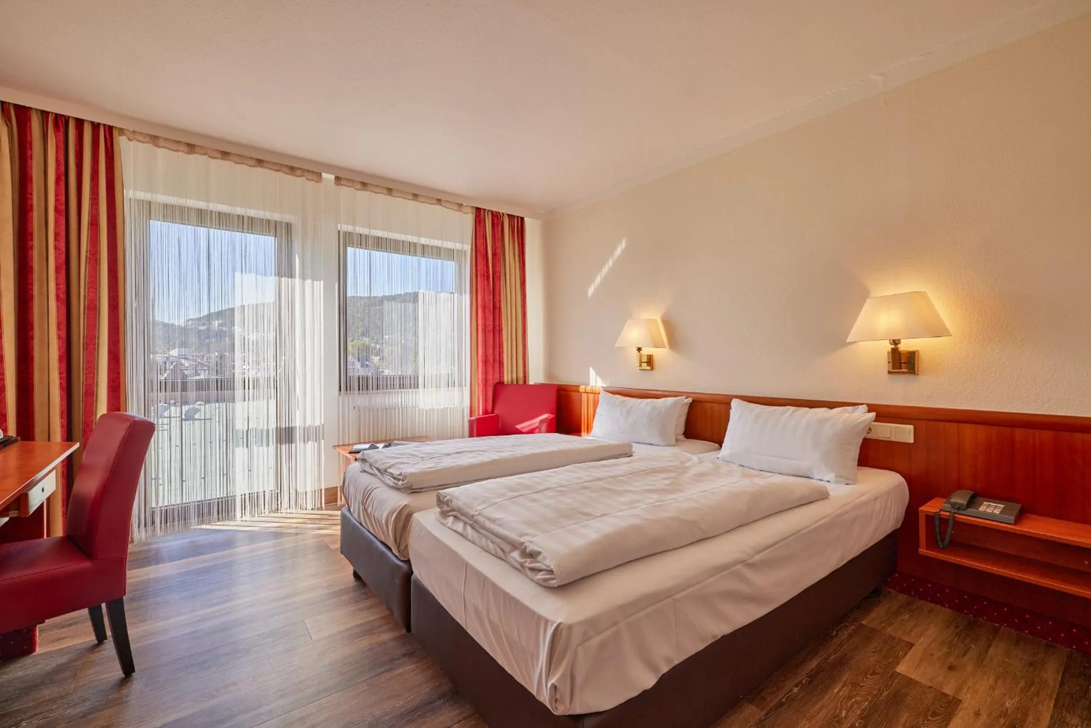 Photo of the whole room, Bed in Mercure Hotel Bad Duerkheim An Den Salinen