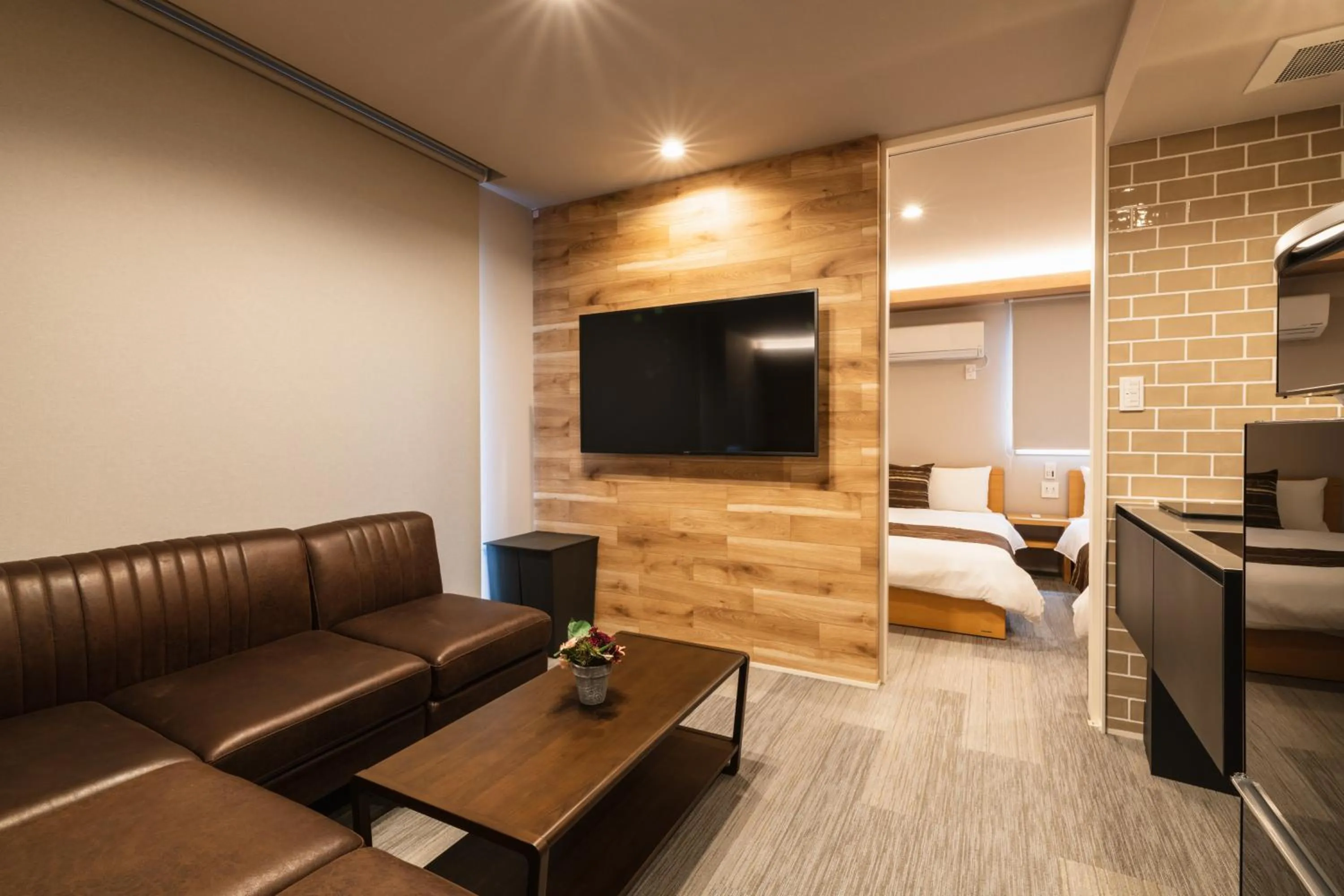 Seating area, Bed in GRAND BASE Urakami