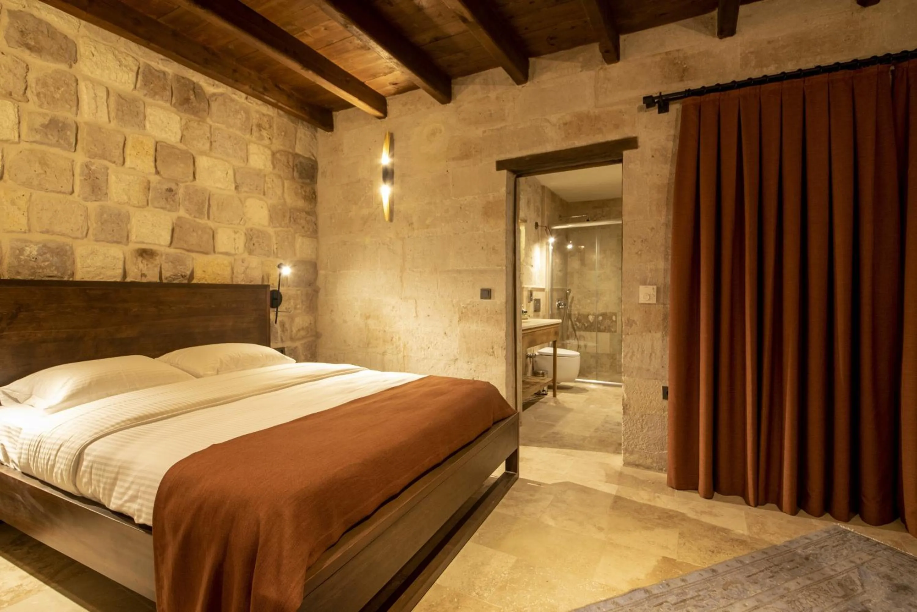 Toilet, Bed in Luvi Cave Hotel