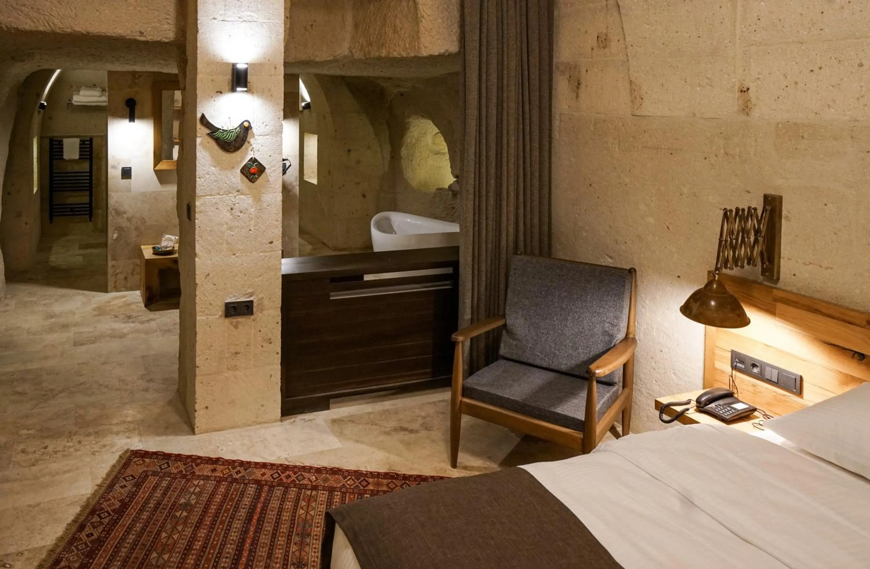 Toilet, Bed in Luvi Cave Hotel