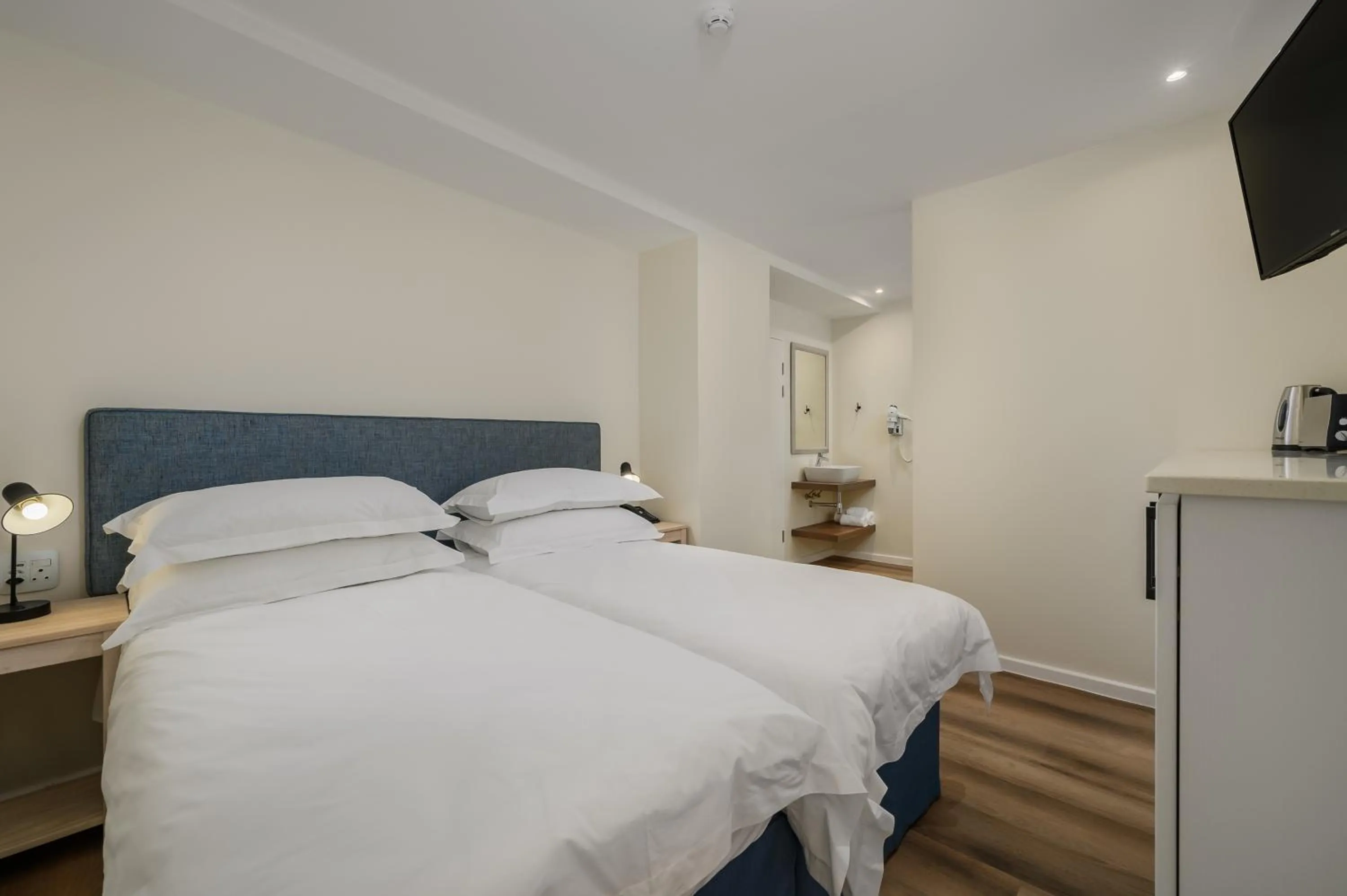 Bed in Paxton Luxury Apartments self-catering