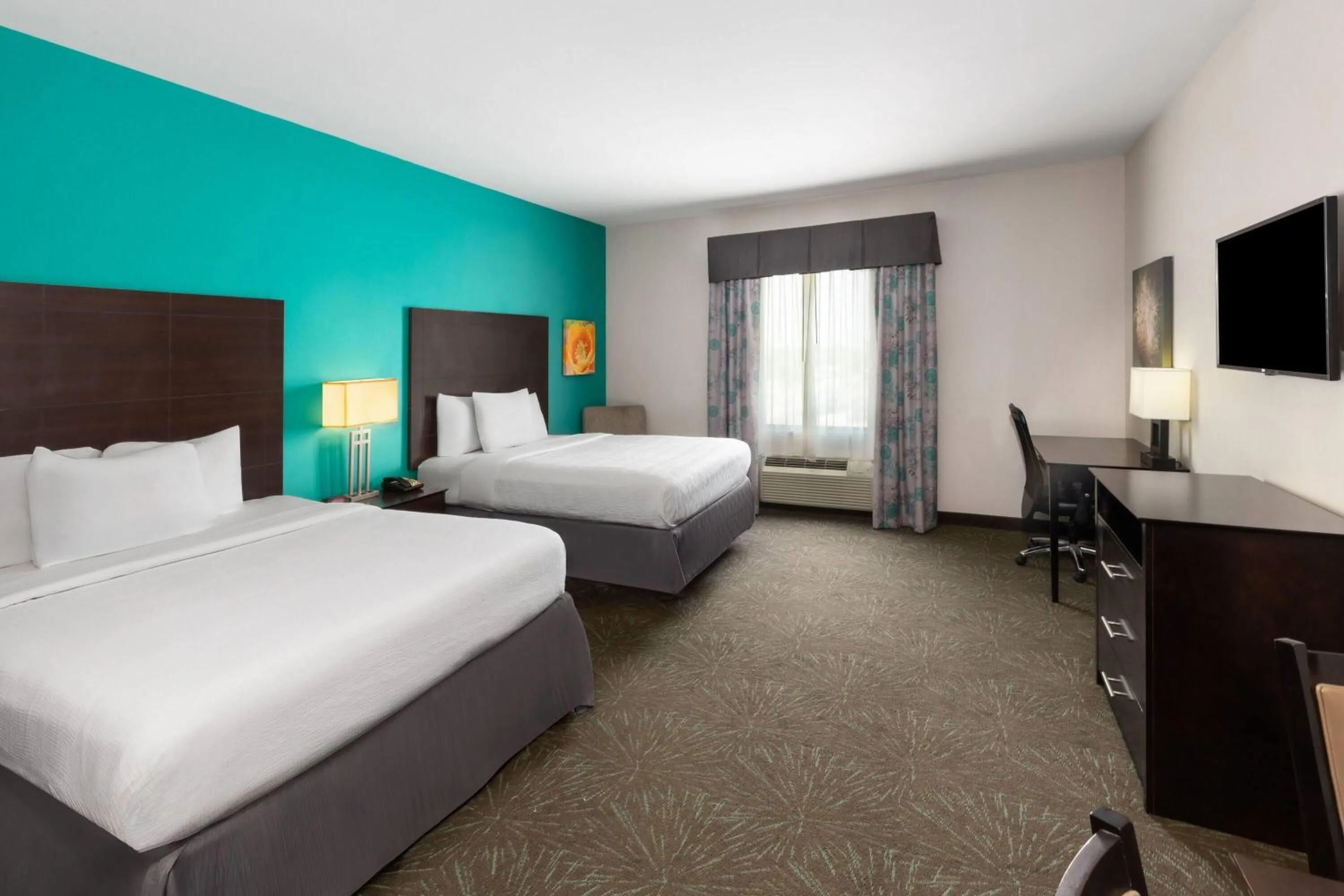 Photo of the whole room, Bed in Baymont by Wyndham Andrews TX