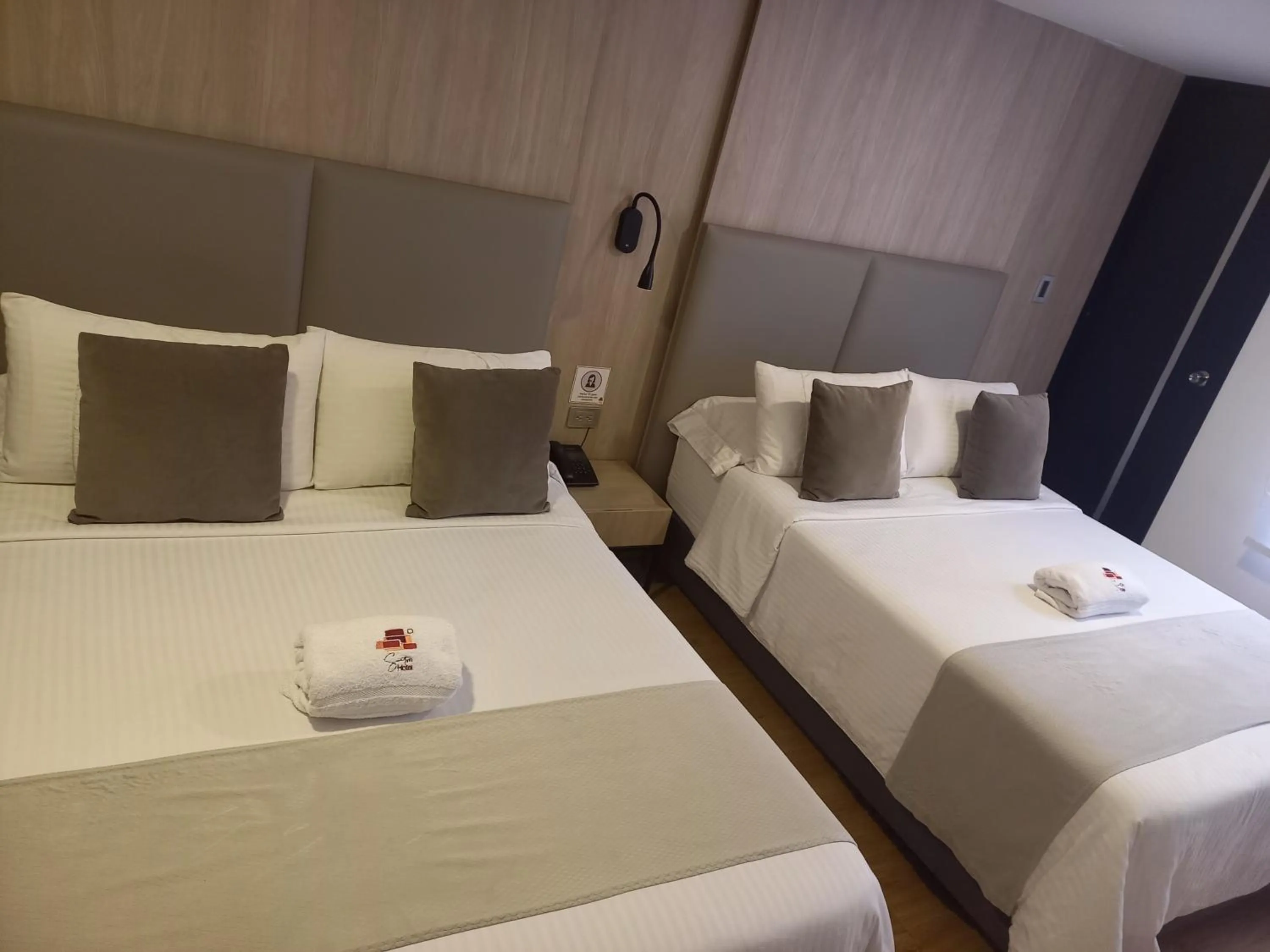 Bed in HOTEL SANTORI