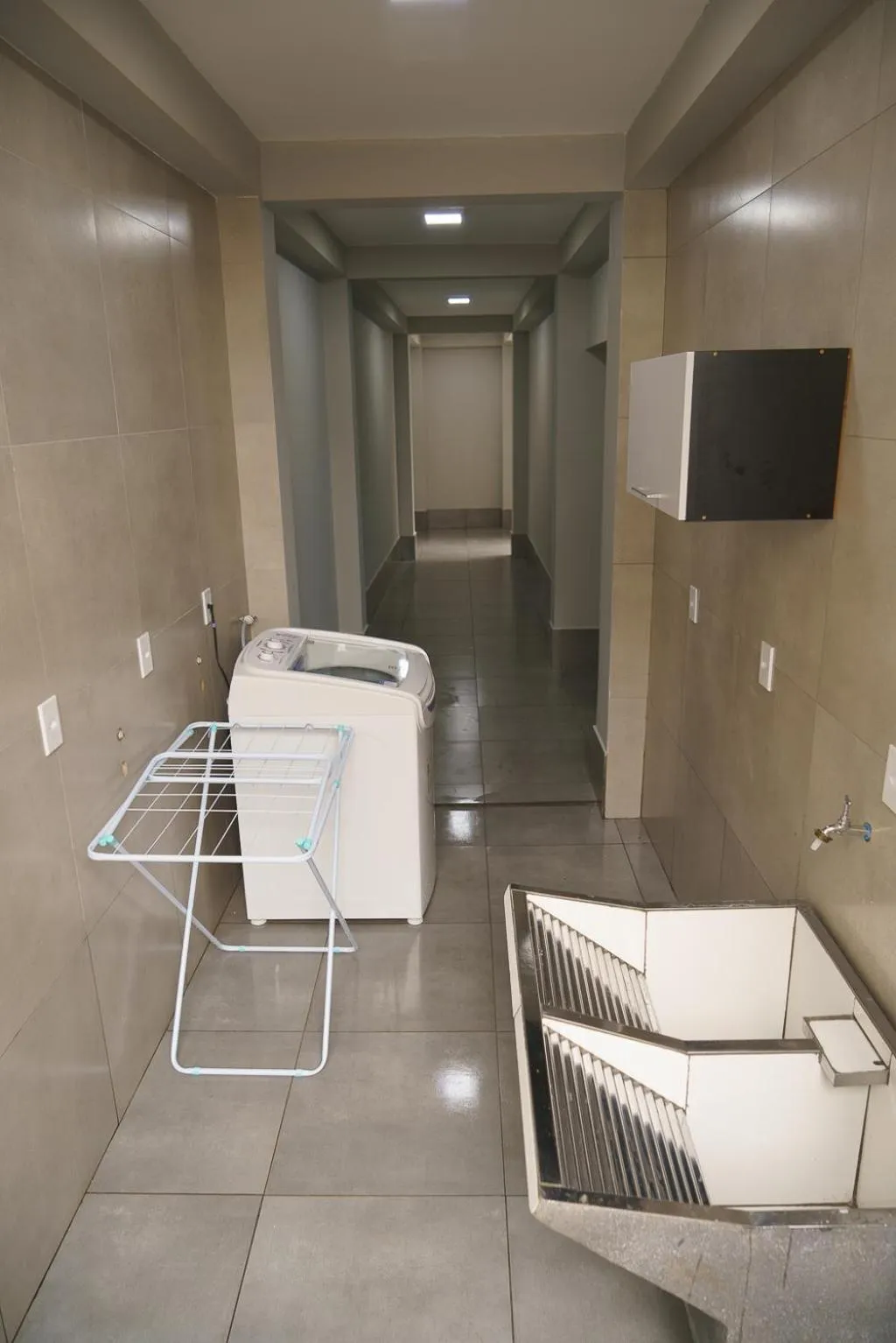 laundry in Vila Castelo Residencial no Centro de Foz