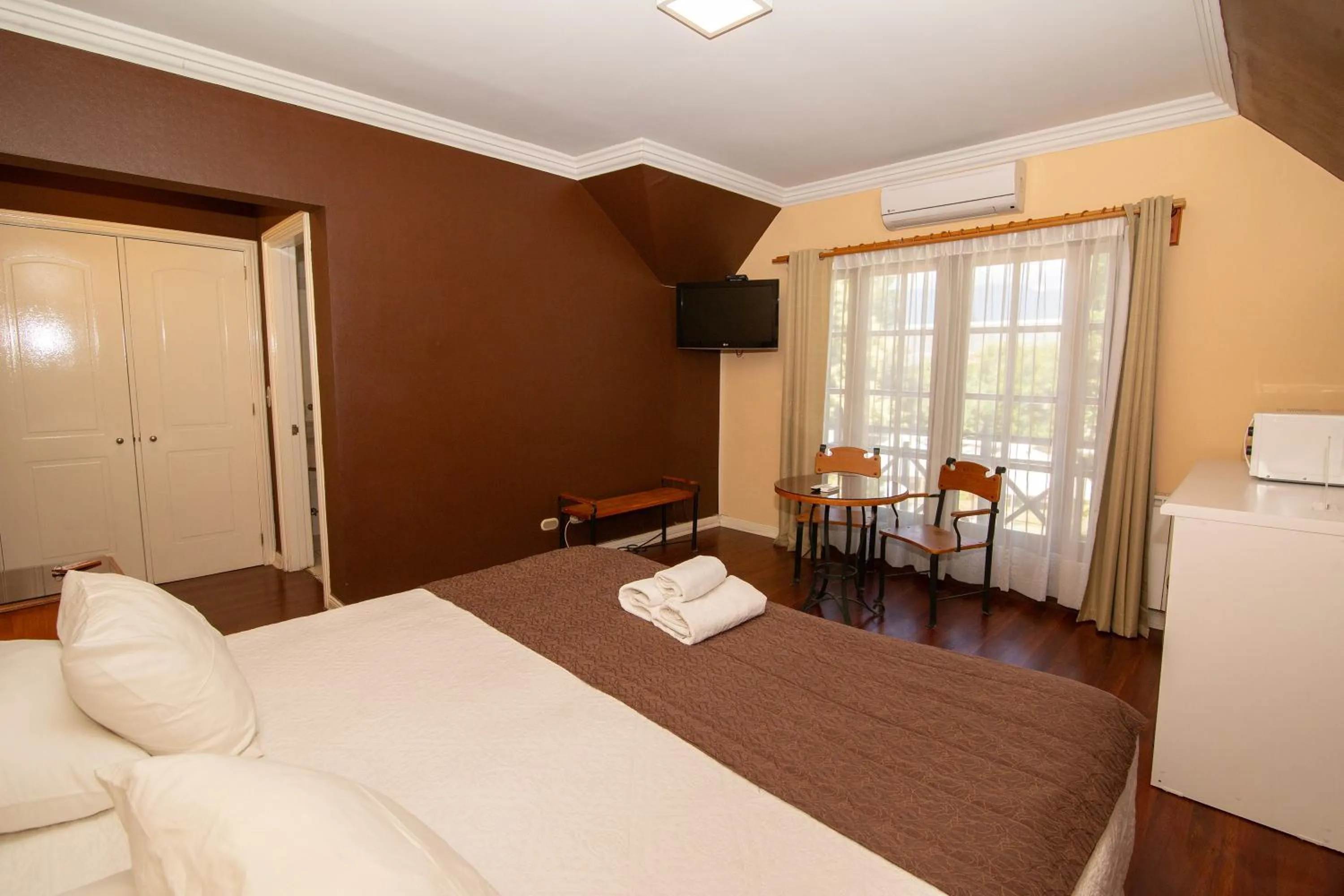 Bed in Hotel Inti Kuyen Plaza