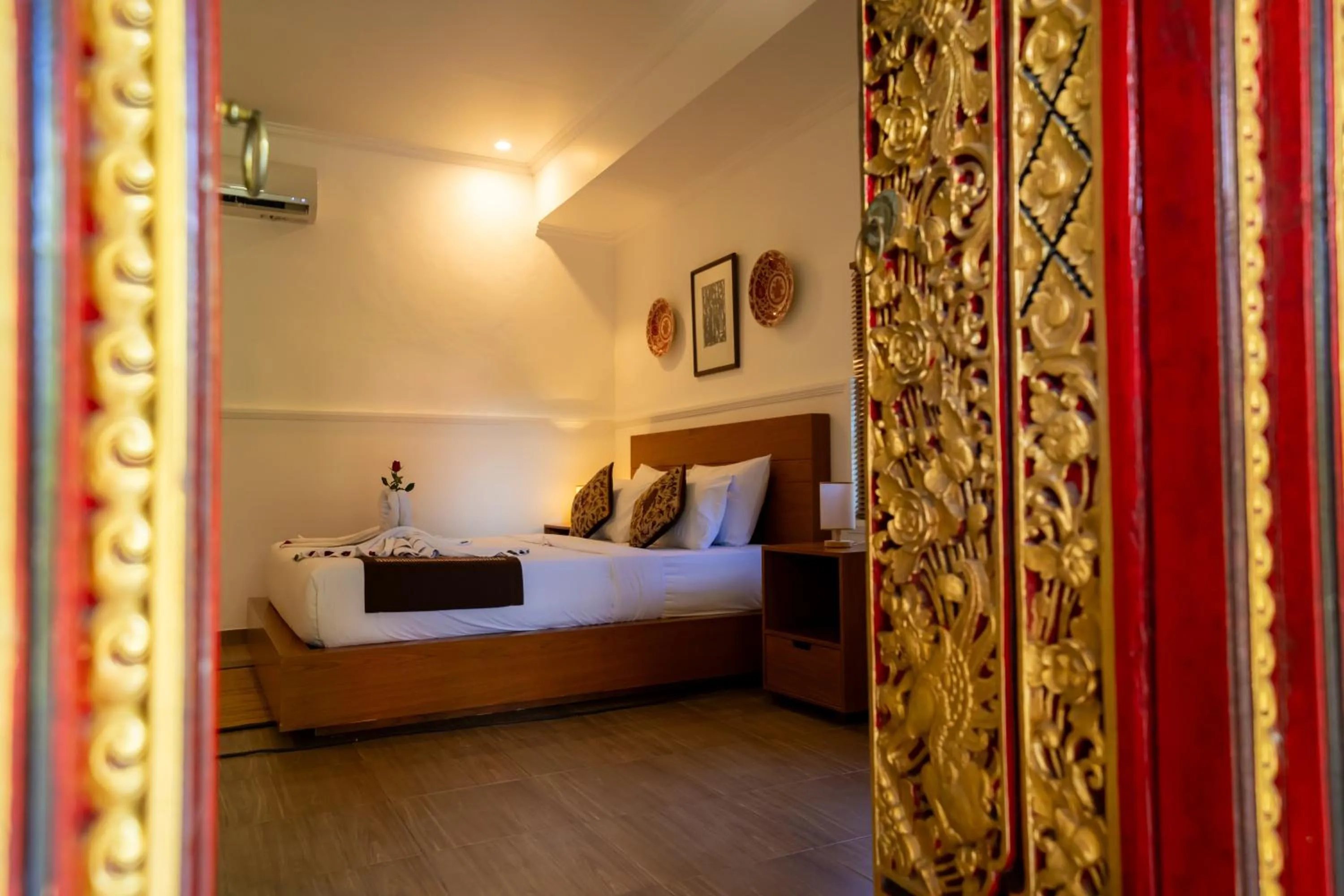 Decorative detail, Bed in Puri Anyar Heritage