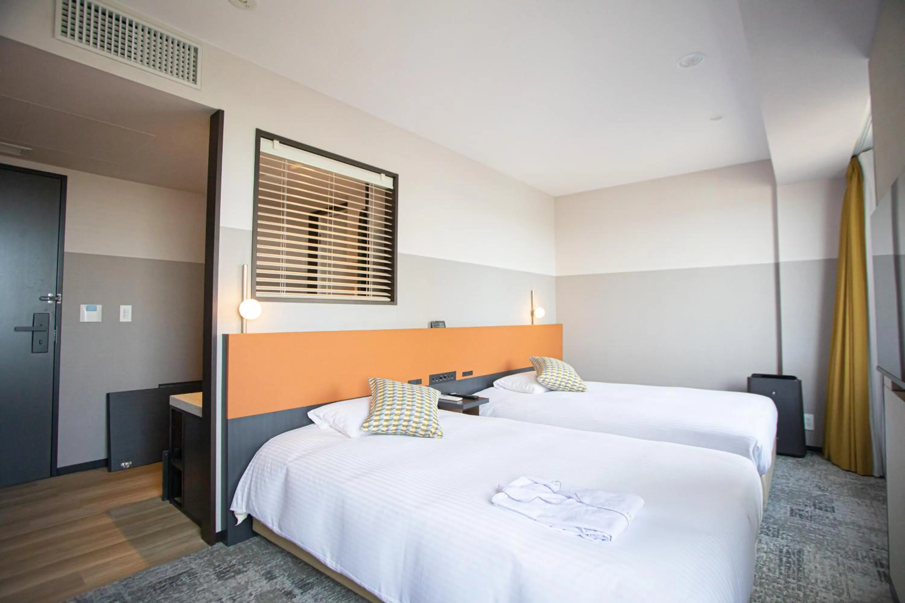 Bed in Wishton Hotel Yukari