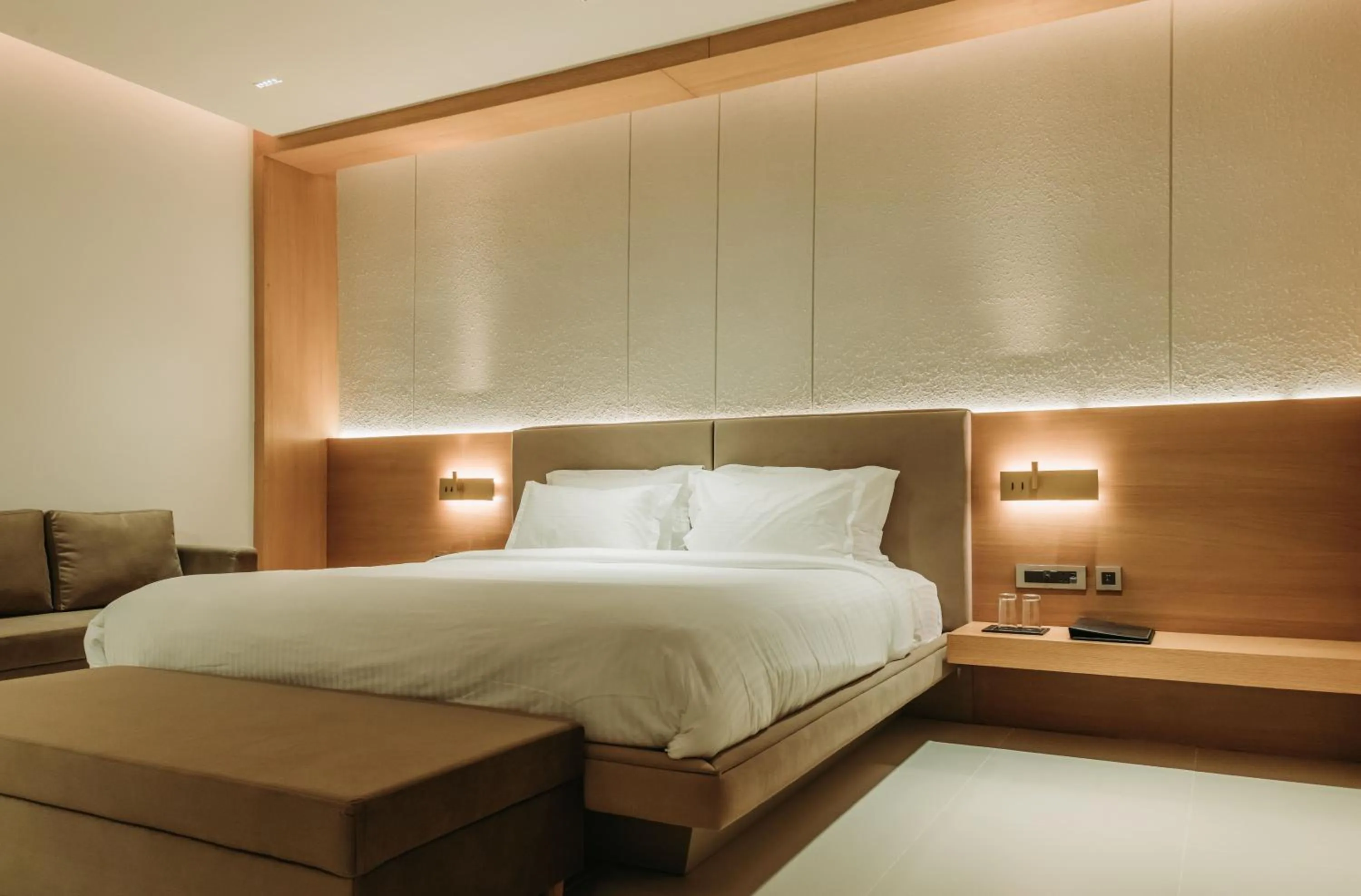 Photo of the whole room, Bed in Naturoville Wellness Resort Rishikesh - Surrounded by Nature, Rooted in Wellness