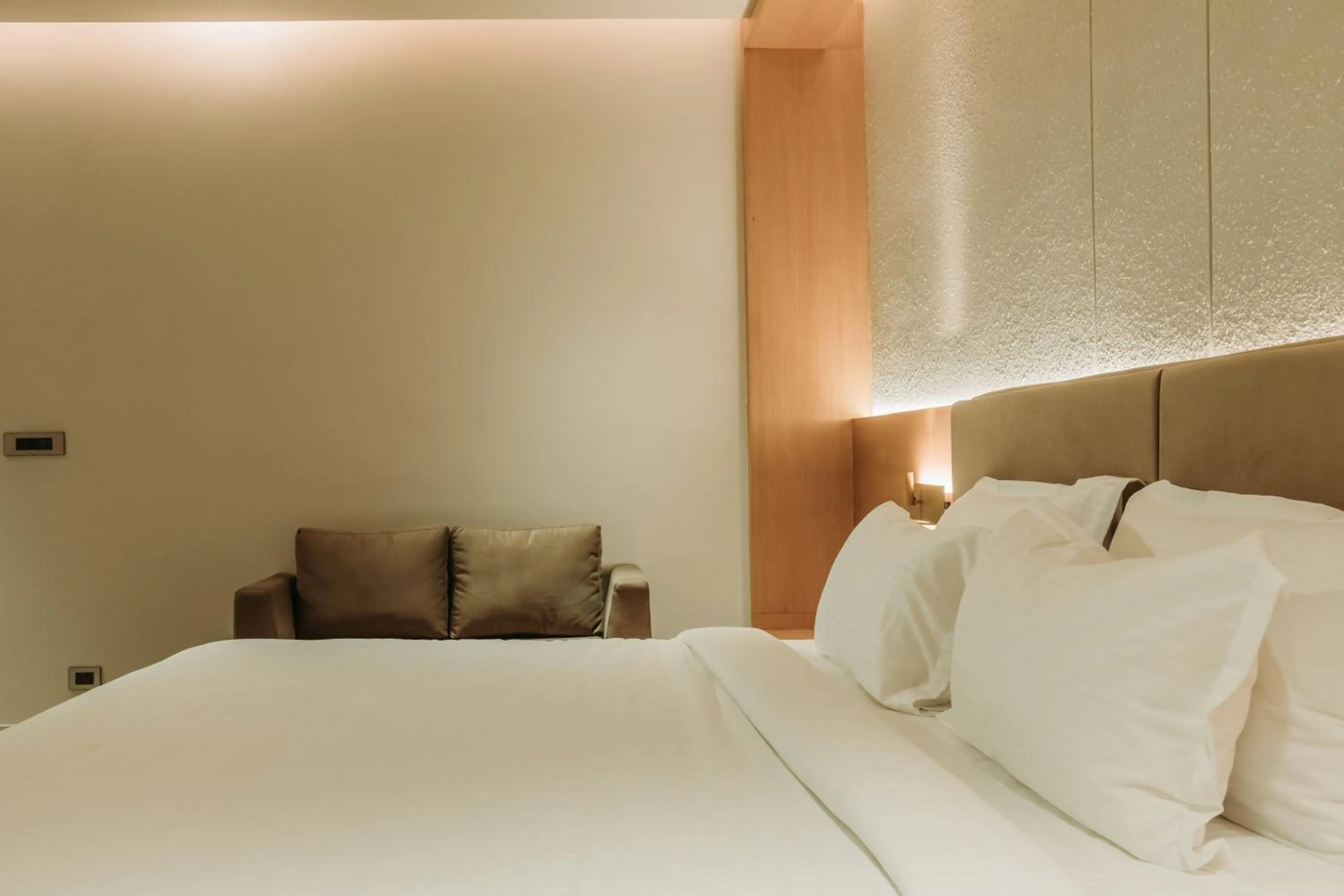 Bed in Naturoville Wellness Resort Rishikesh - Surrounded by Nature, Rooted in Wellness