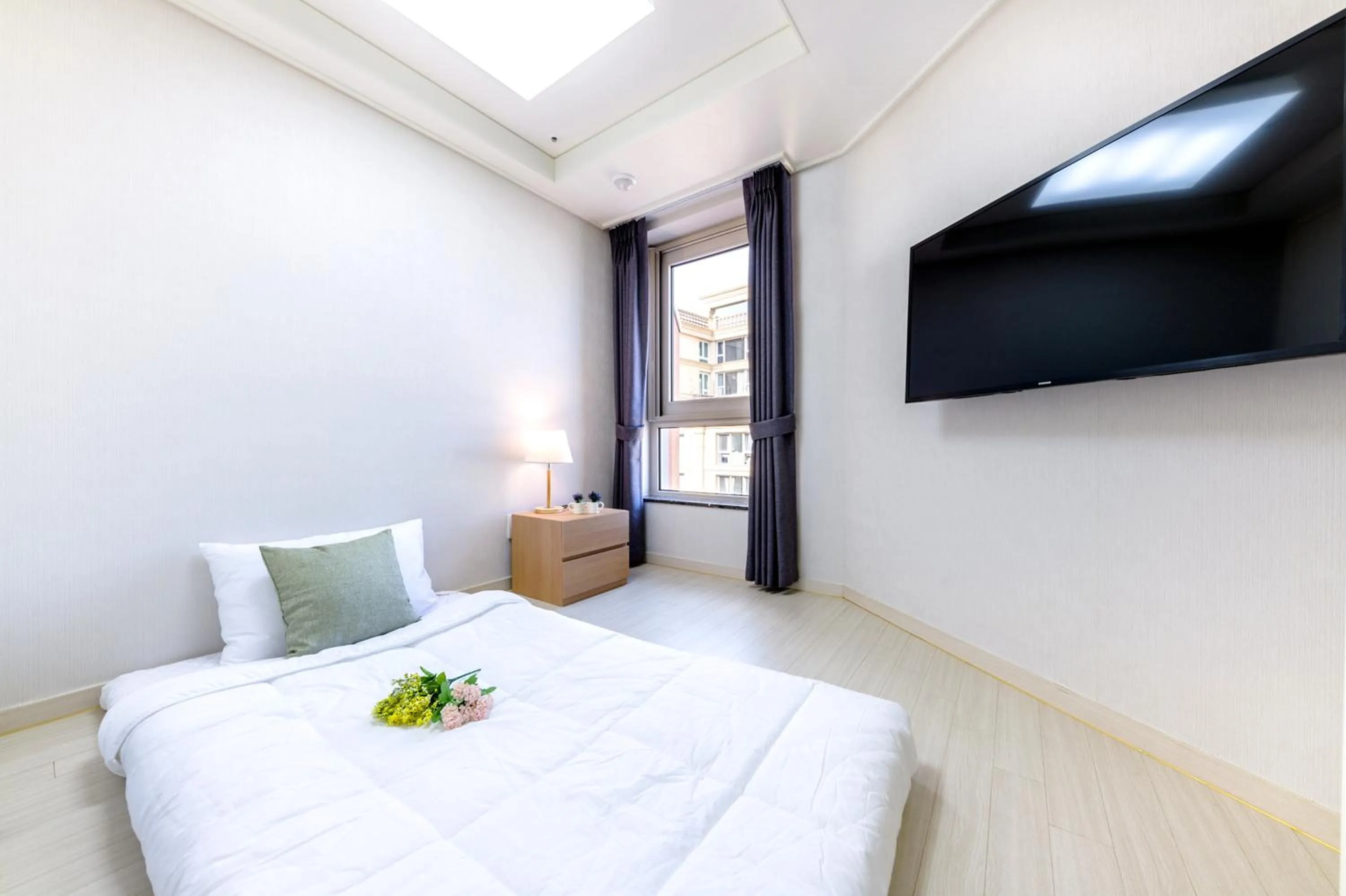 Bed in Shin Shin Hotel Seogwipo