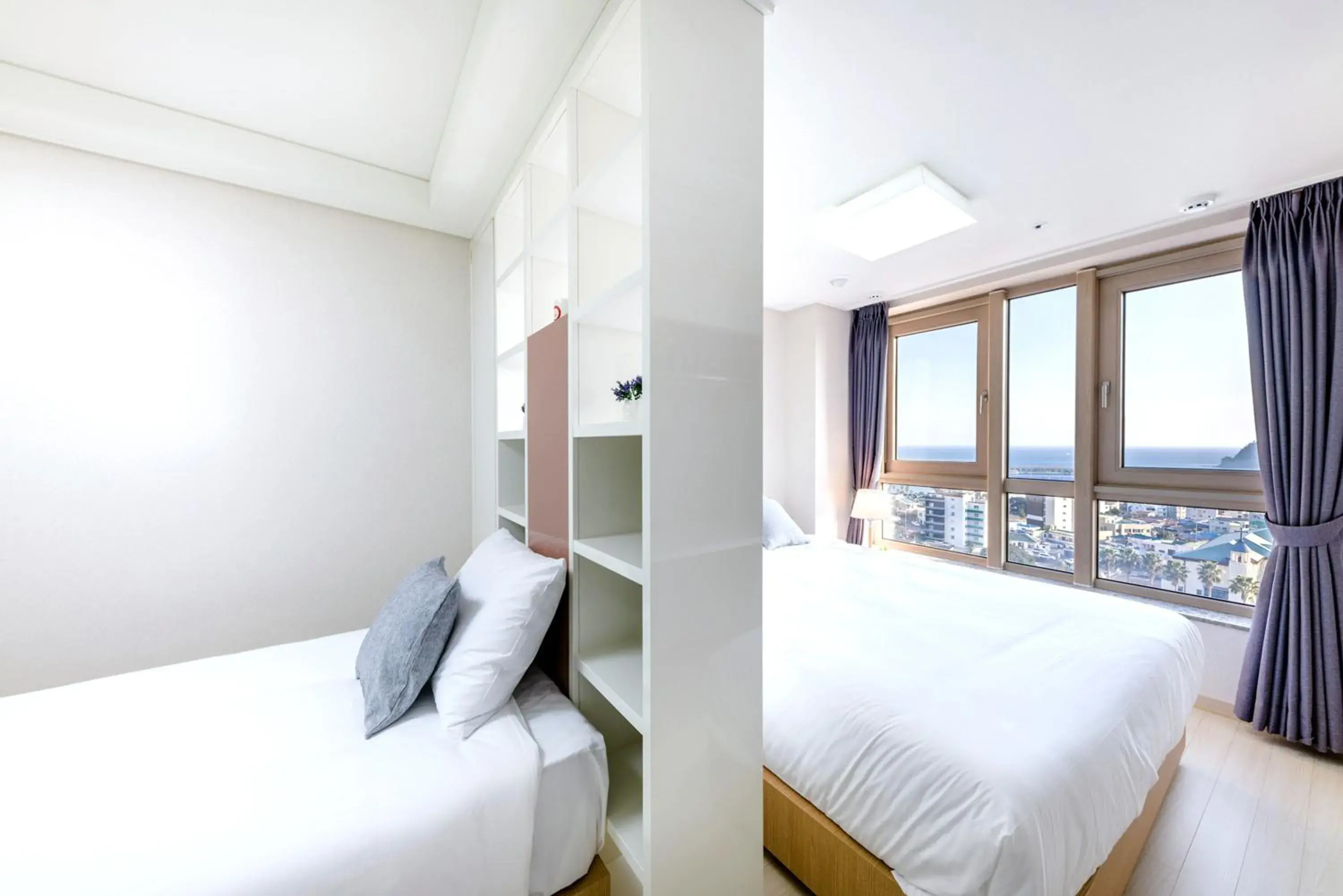 Family Twin Room with Sea View in Shin Shin Hotel Seogwipo Family Twin Room with Sea View in Shin Shin Hotel Seogwipo