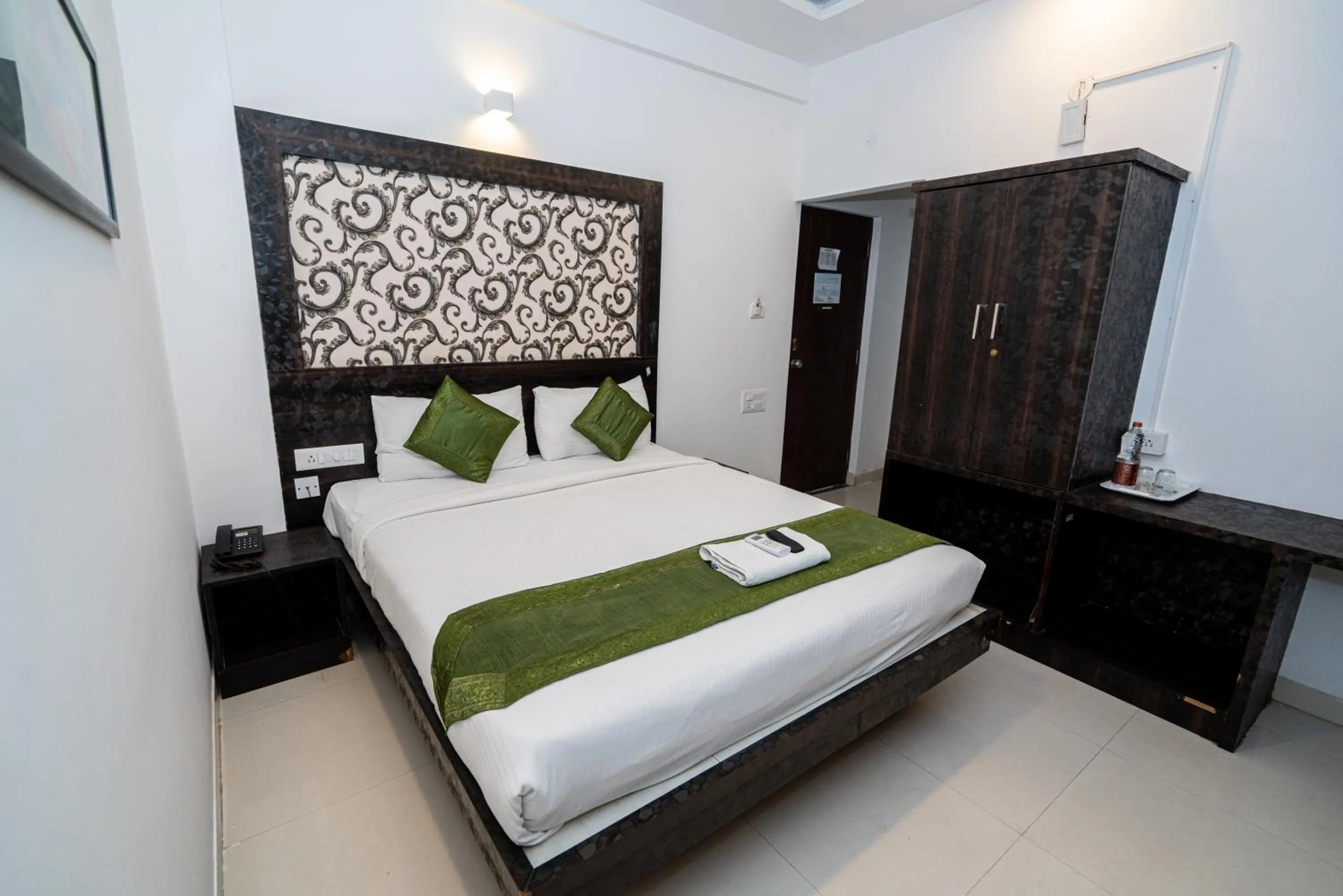 Bed in Hotel Dhruv Palace Bangalore Jakkur