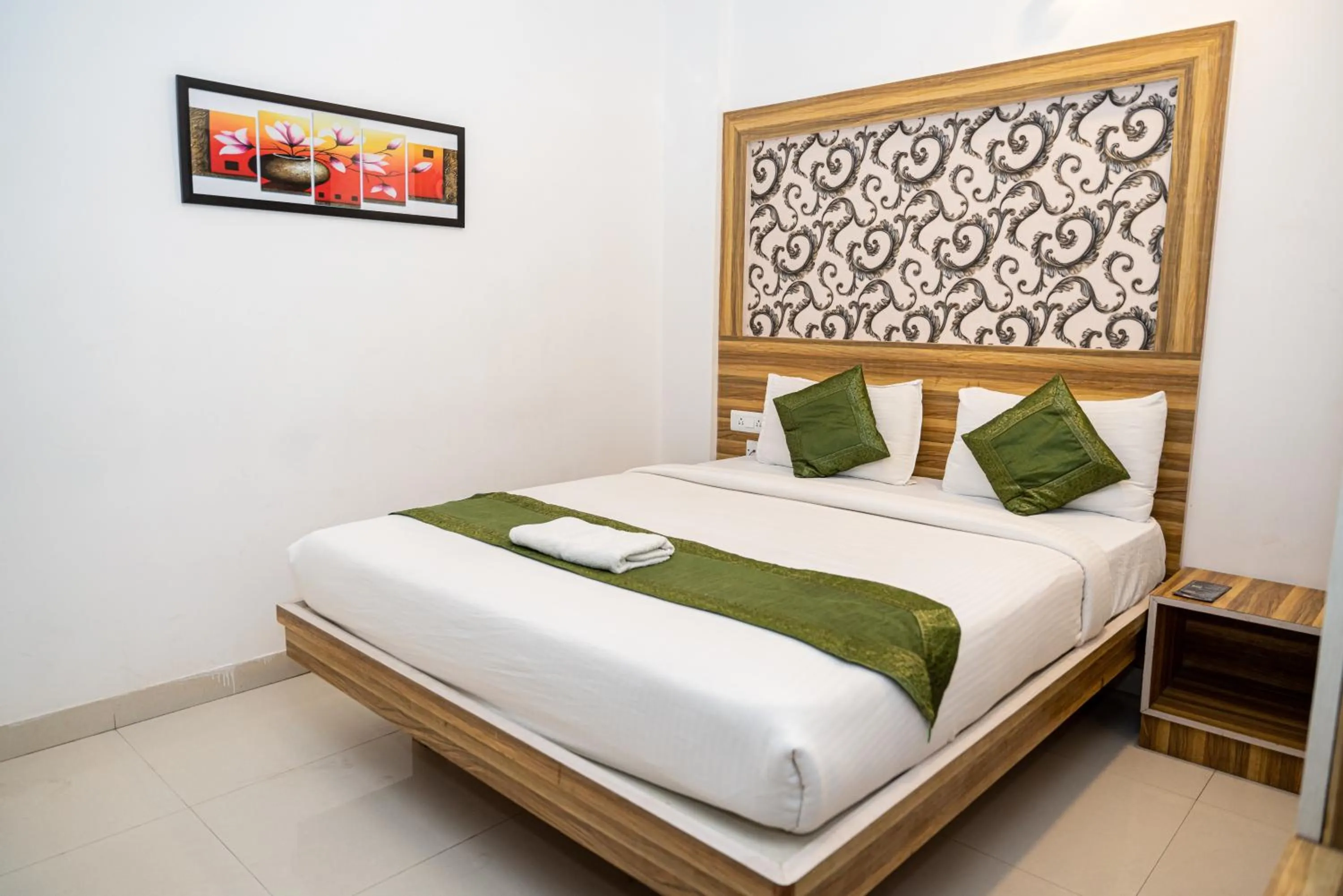 Bed in Hotel Dhruv Palace Bangalore Jakkur