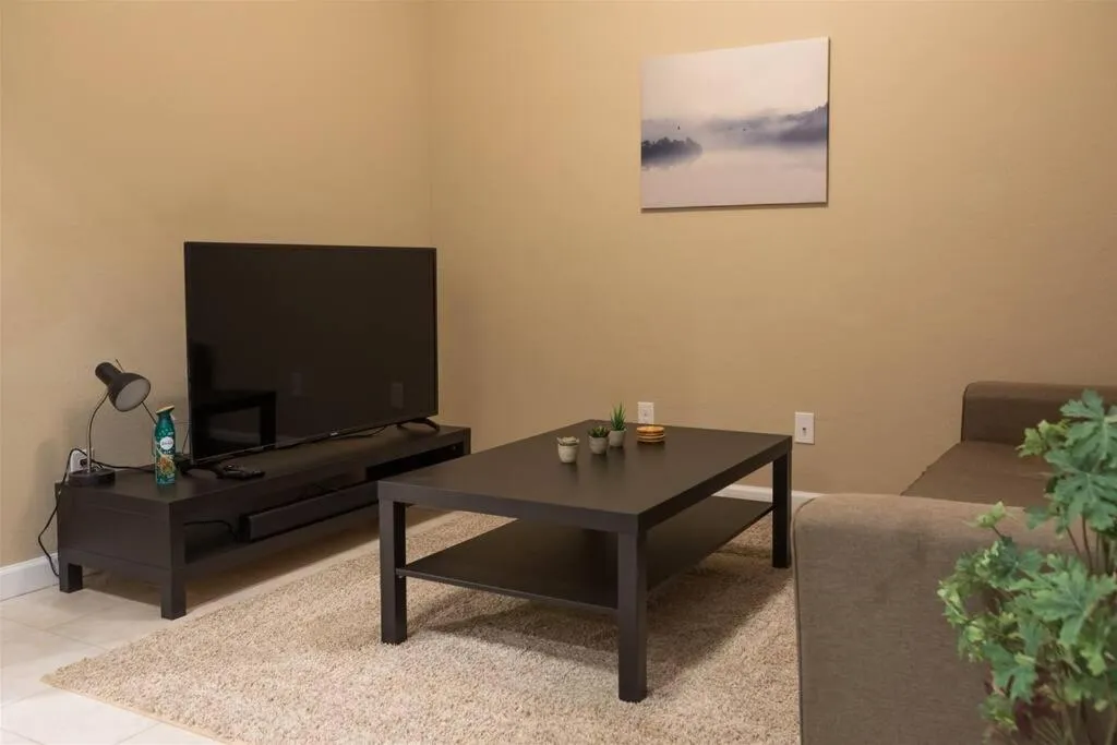 Gated townhouse with 2 suites, heated pool, hot tub