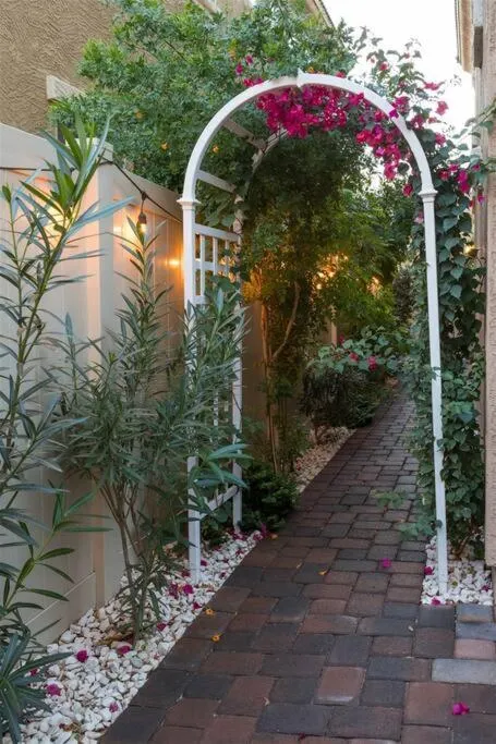 Gated townhouse with 2 suites, heated pool, hot tub