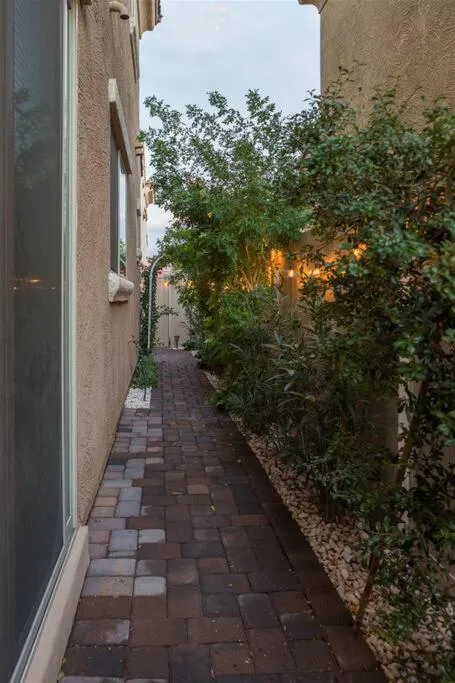 Gated townhouse with 2 suites, heated pool, hot tub