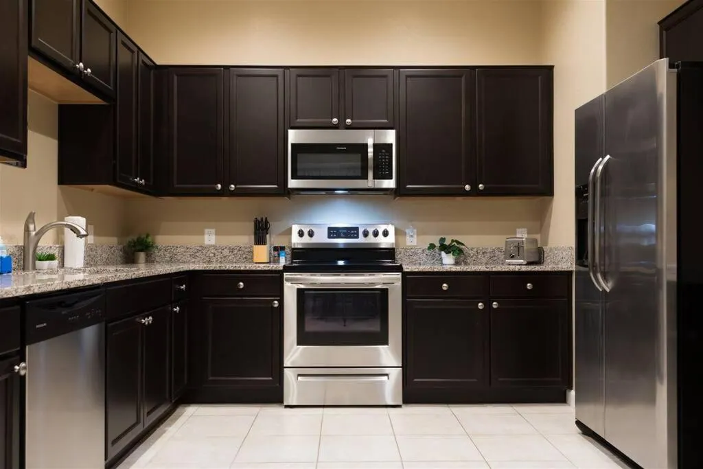 Gated townhouse with 2 suites, heated pool, hot tub