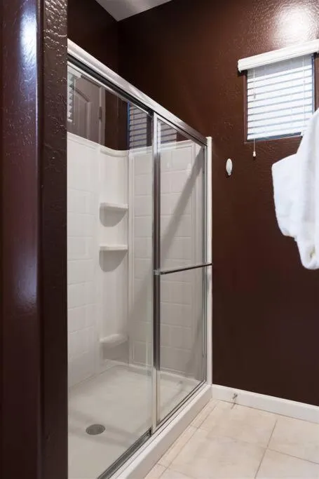 Gated townhouse with 2 suites, heated pool, hot tub