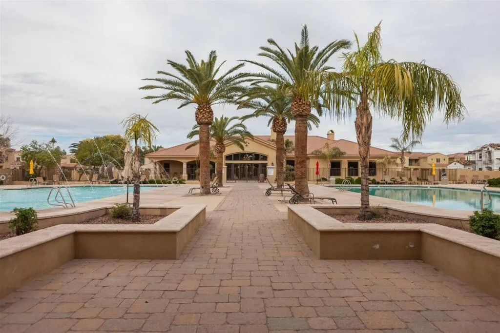 Gated townhouse with 2 suites, heated pool, hot tub