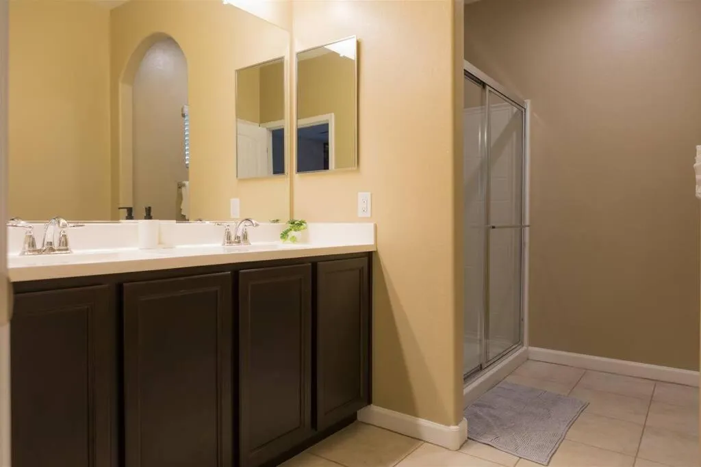 Gated townhouse with 2 suites, heated pool, hot tub