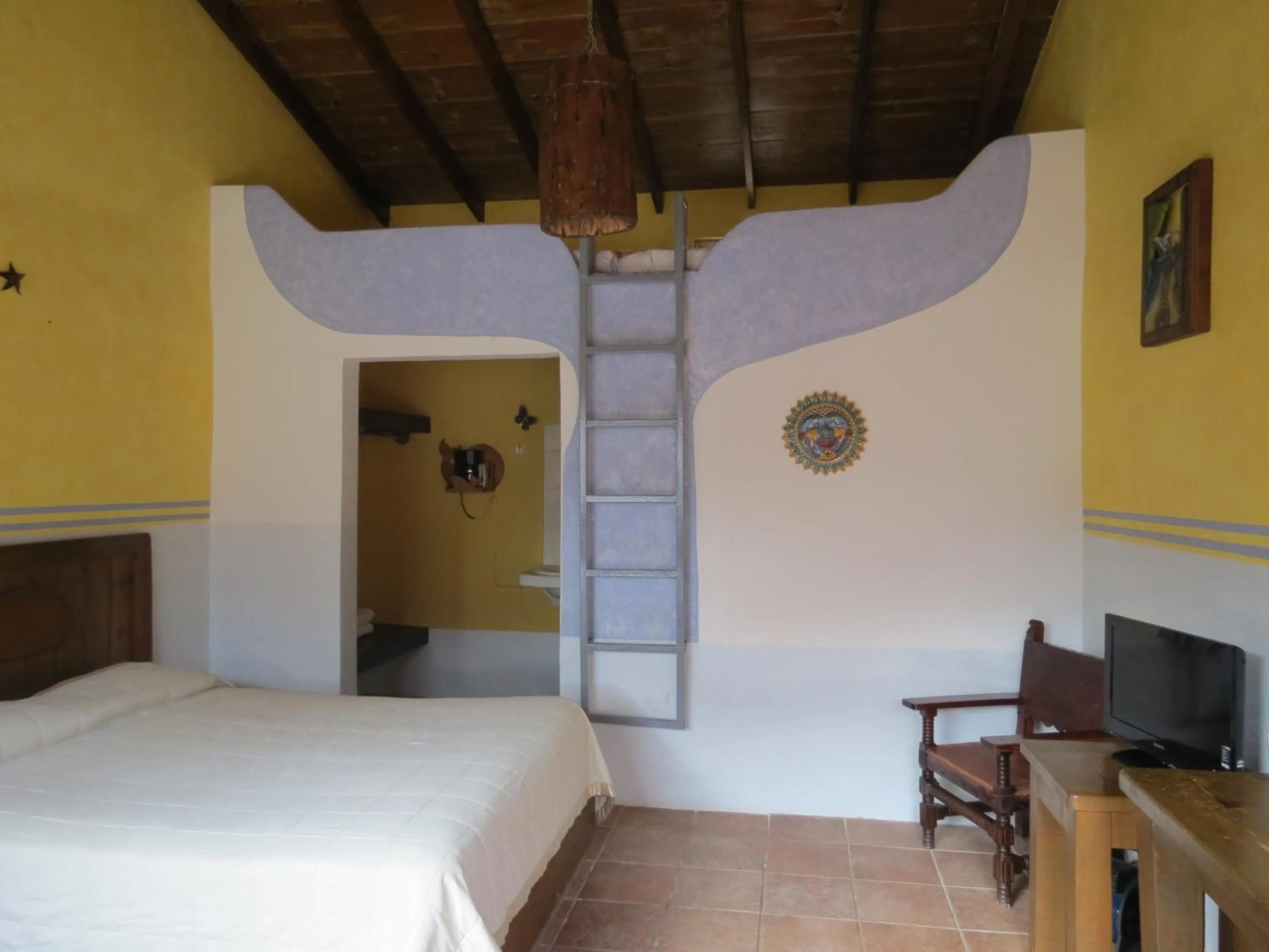 Bed in Restaurante Malarrimo Hotel & RV Parking