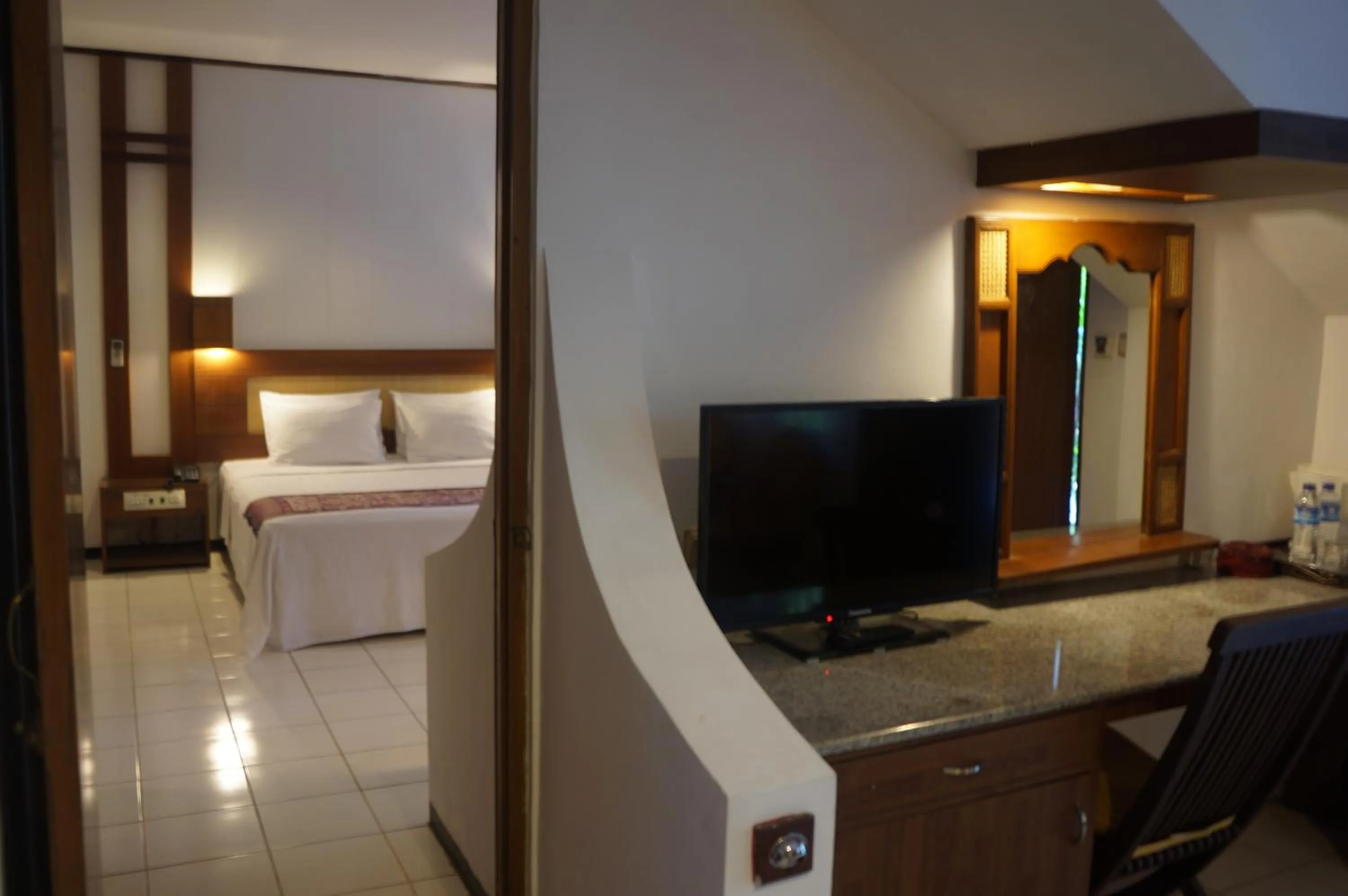 Toilet, Bed in Puri Naga Beachfront Cottages