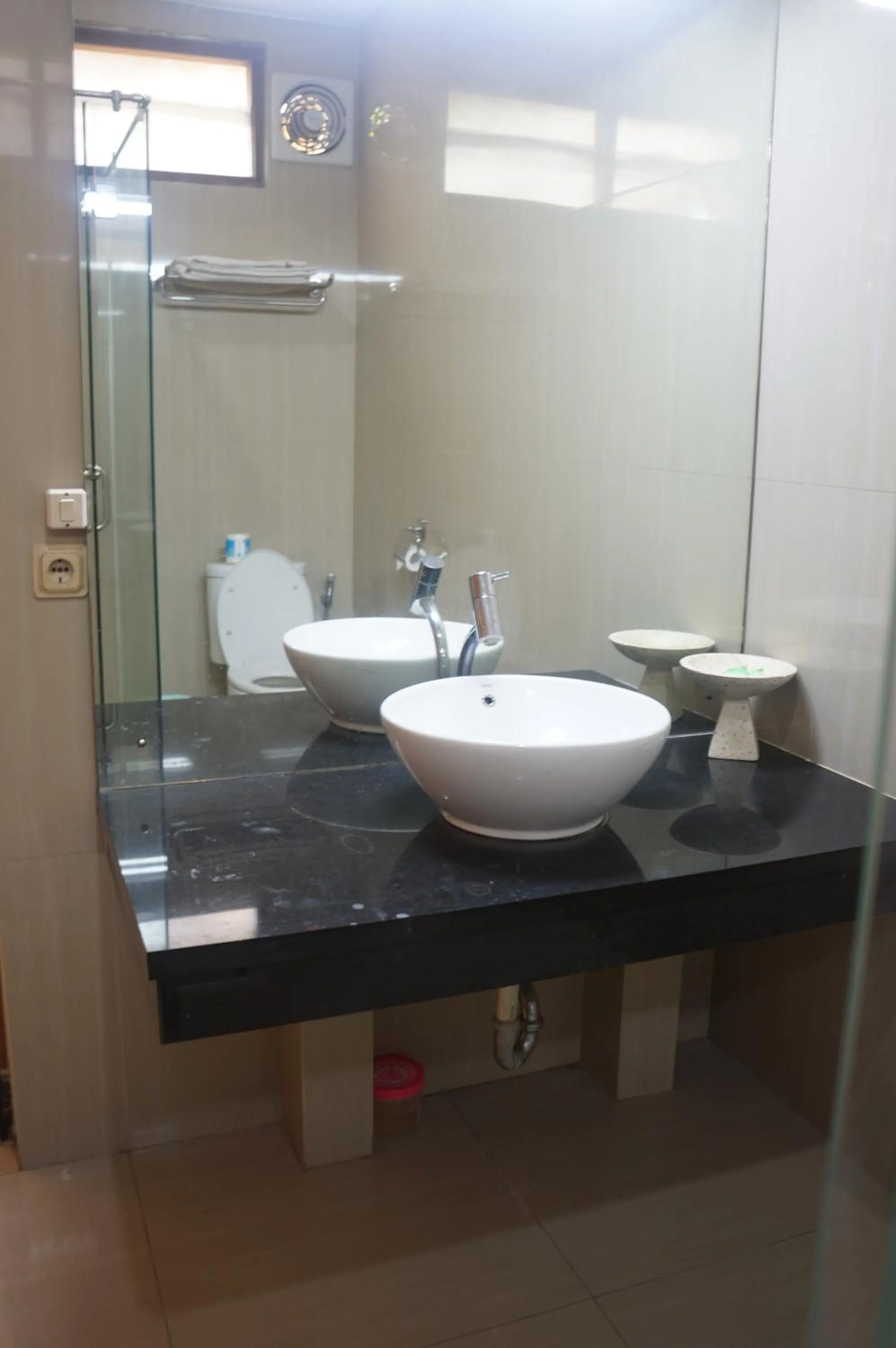 Shower in Puri Naga Beachfront Cottages