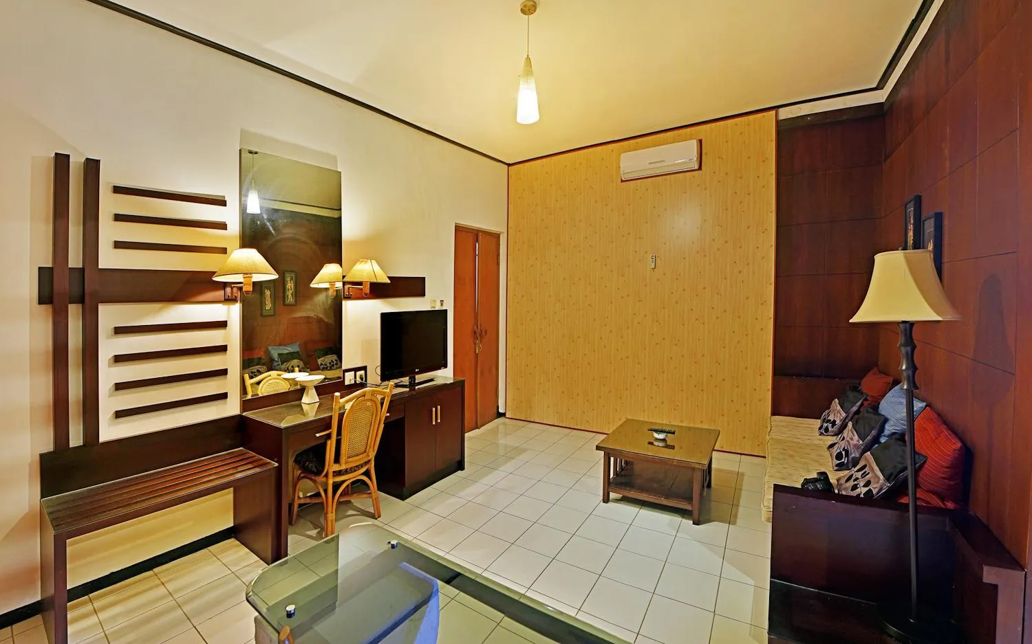 Toilet, Bed in Puri Naga Beachfront Cottages