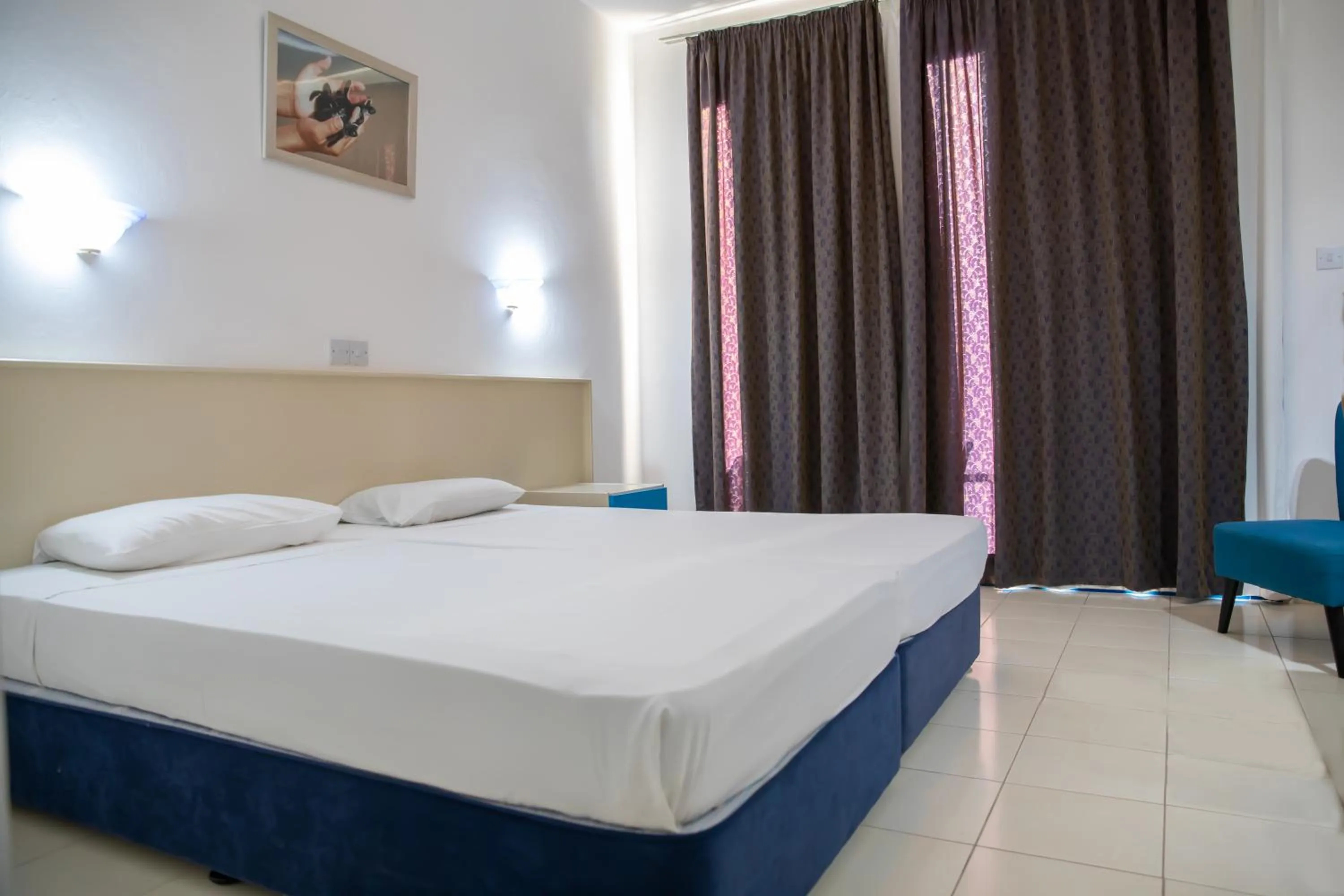 Bed in West End Hotel