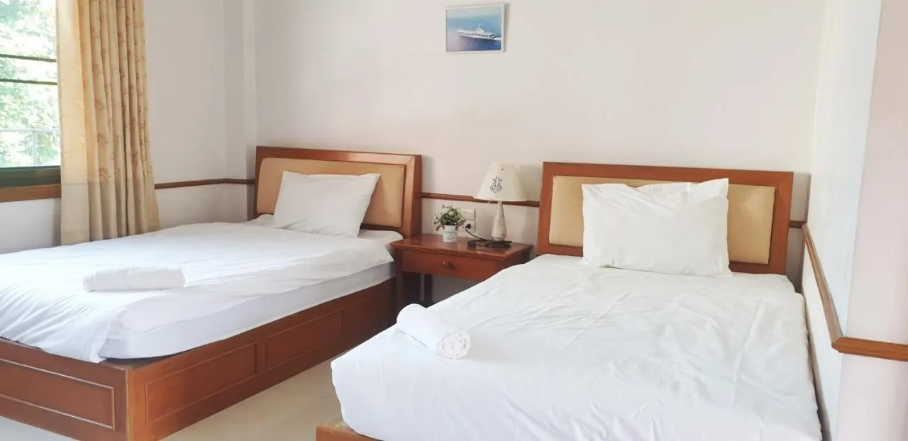 Bed in NAVY HOME HOTEL โรงแรมเนวี่โฮม