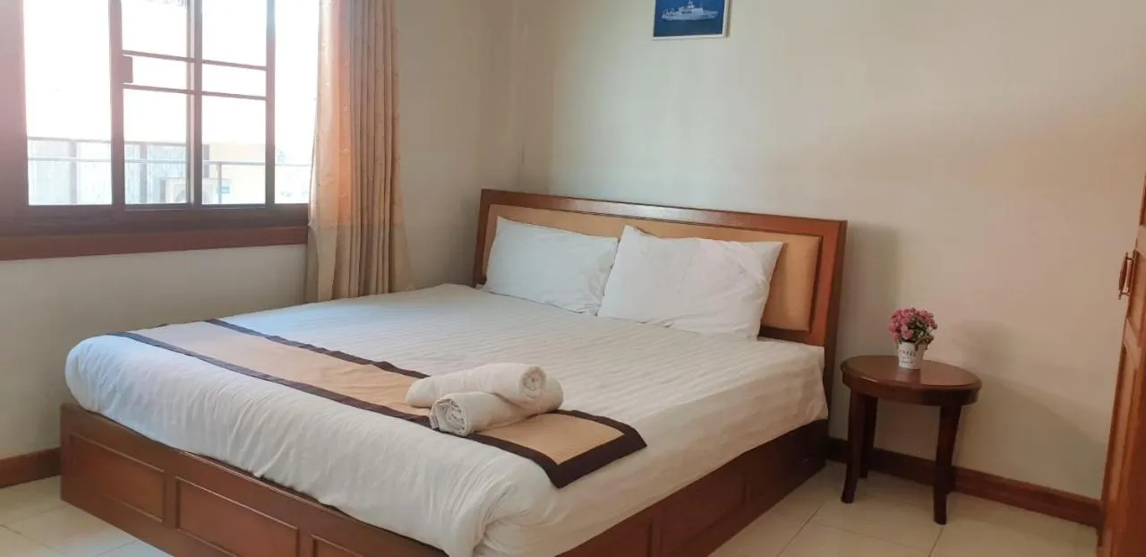 Bed in NAVY HOME HOTEL โรงแรมเนวี่โฮม