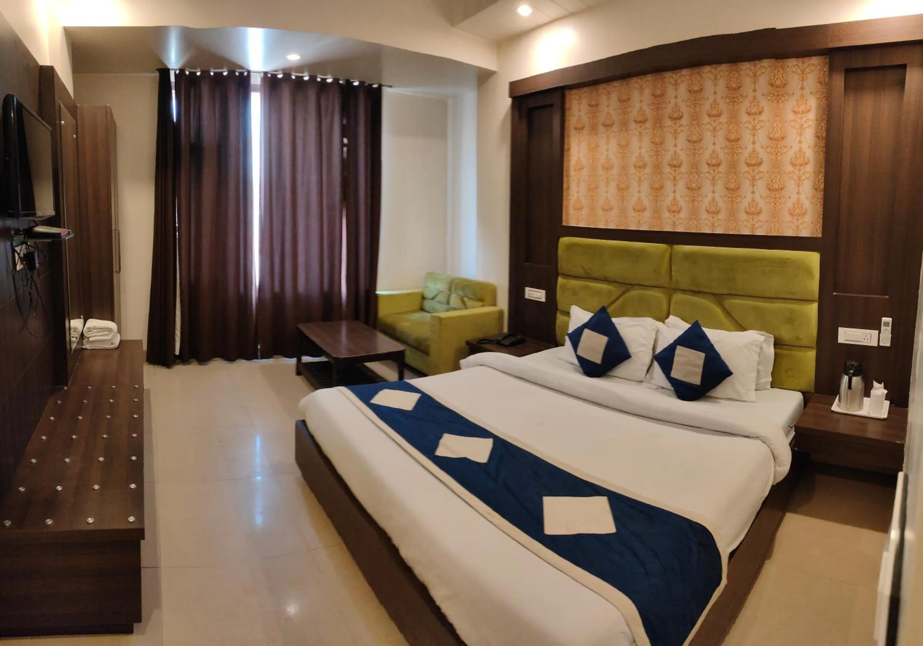 Photo of the whole room, Bed in Hotel Krishna