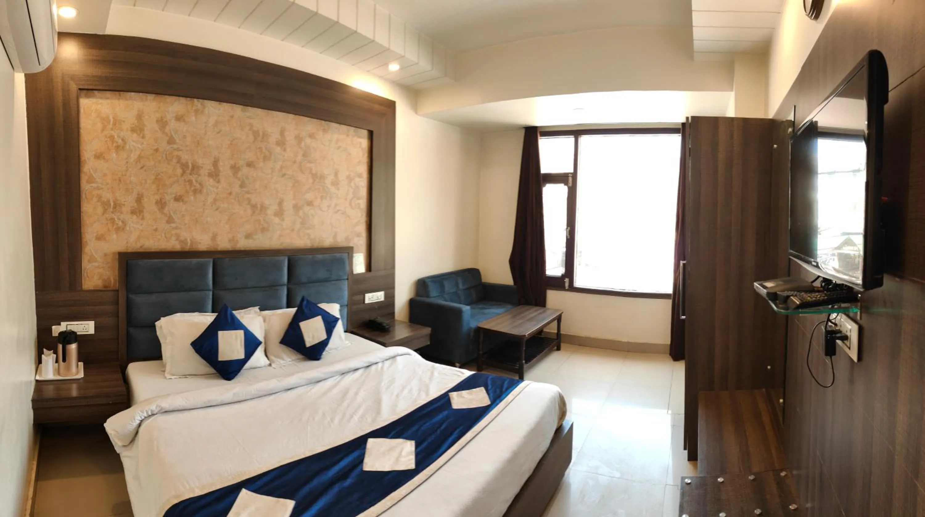 Photo of the whole room, Bed in Hotel Krishna