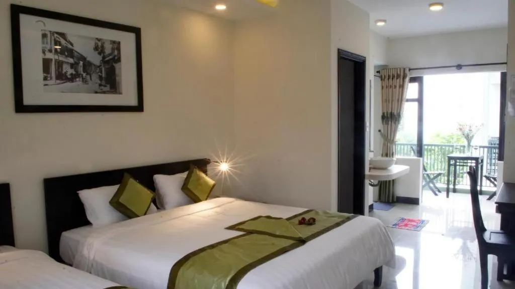 Bed in Starfruit villa Hoi An