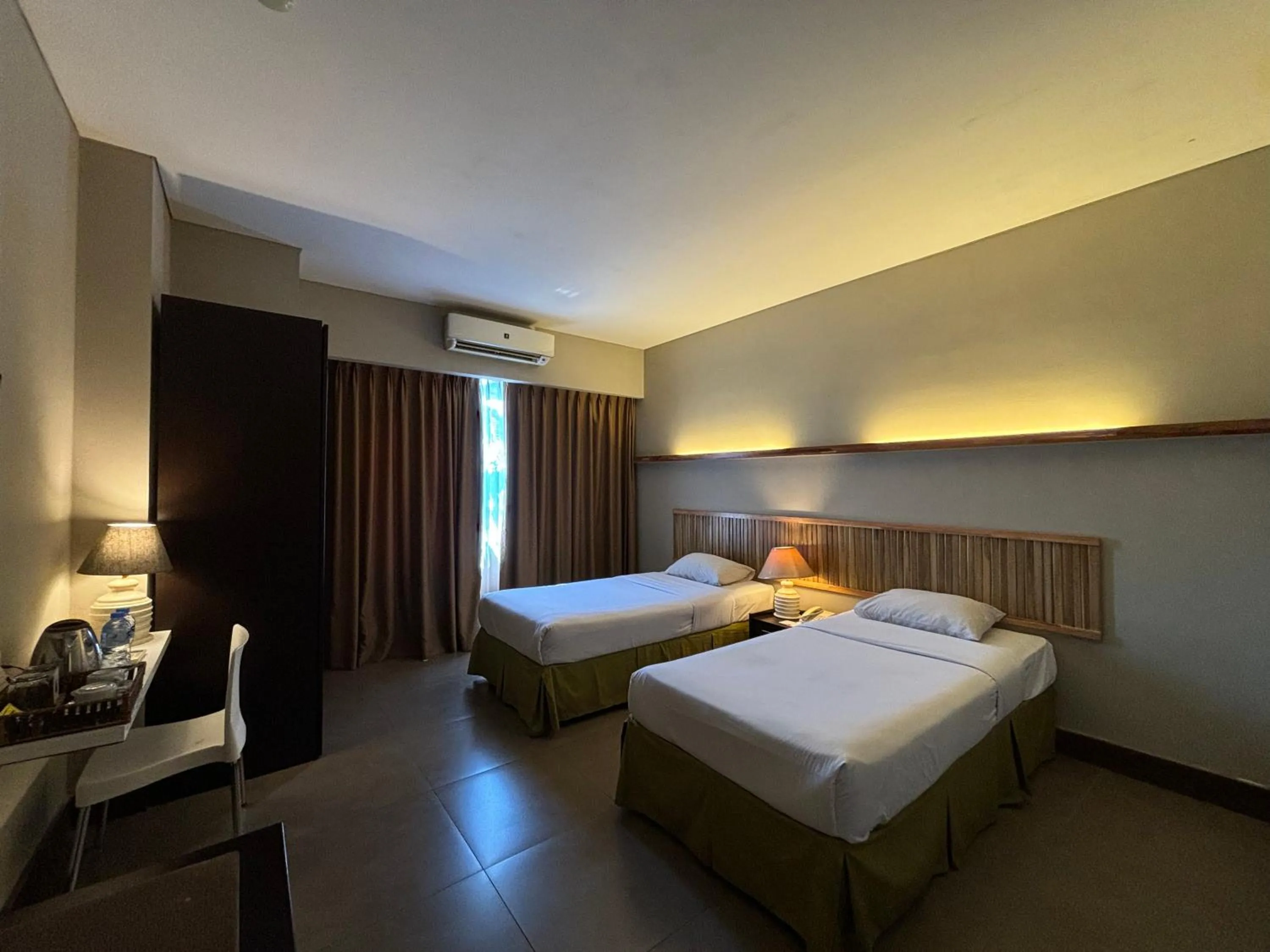 Photo of the whole room, Bed in Bali World Hotel