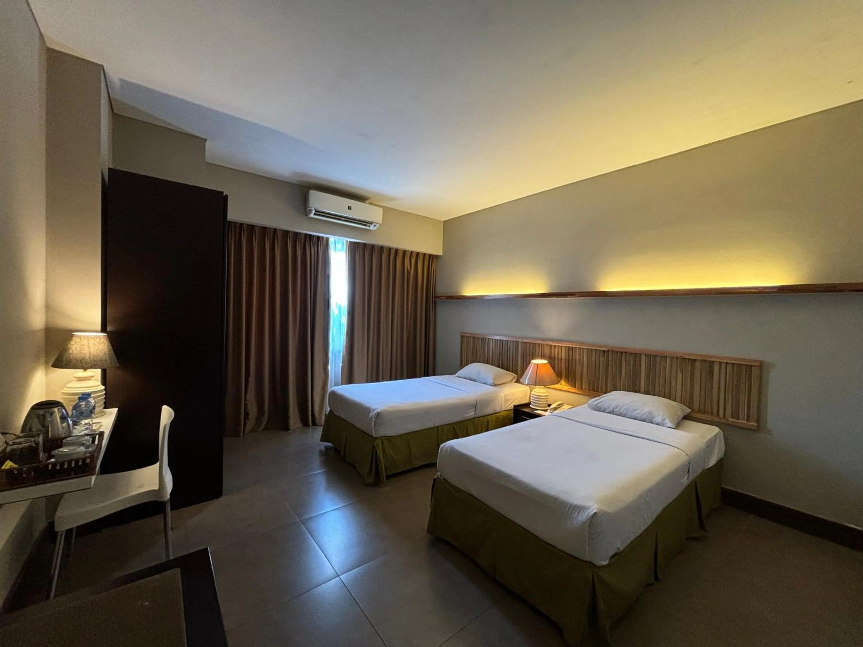 Bed in Bali World Hotel