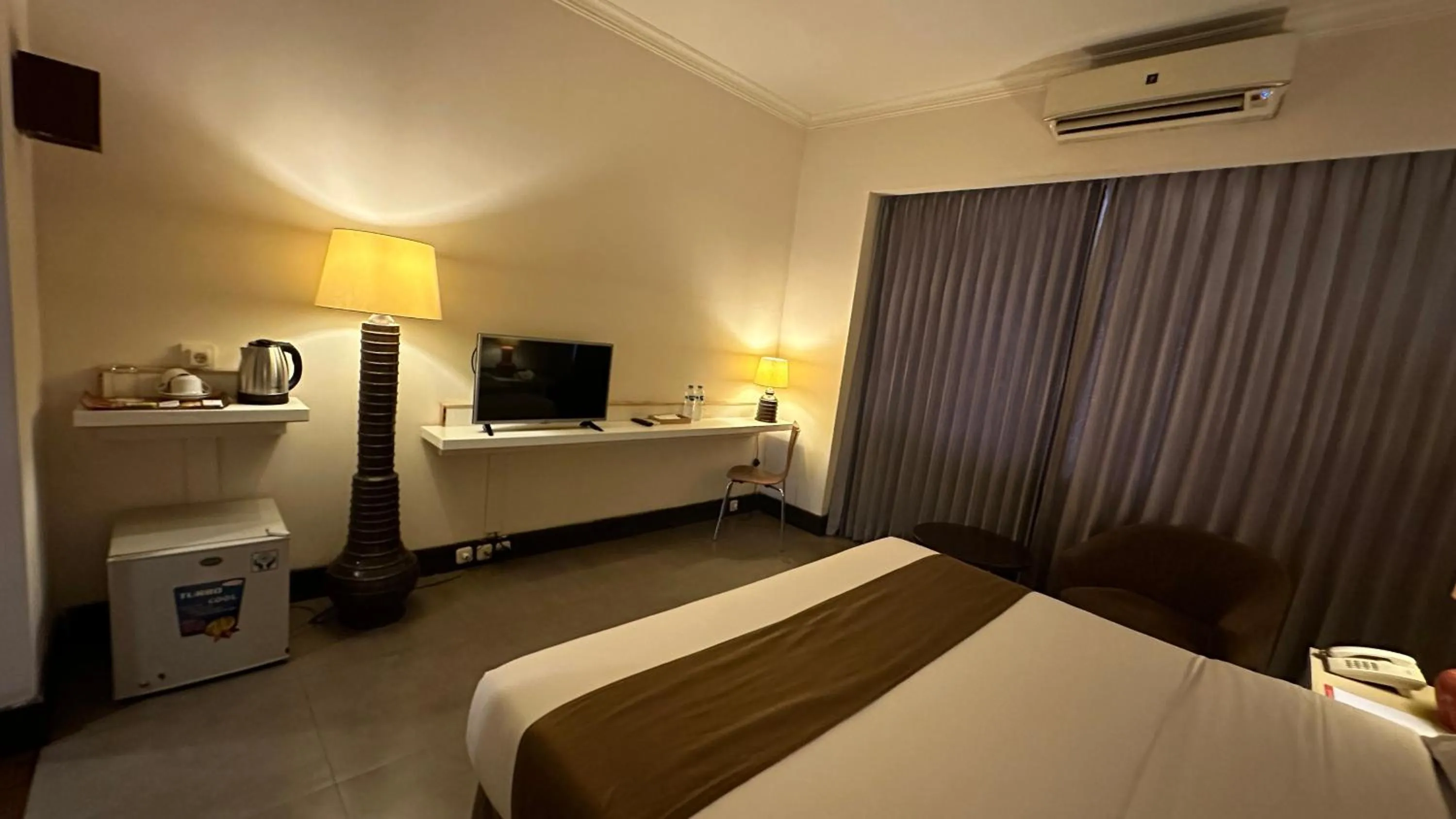 Bed in Bali World Hotel