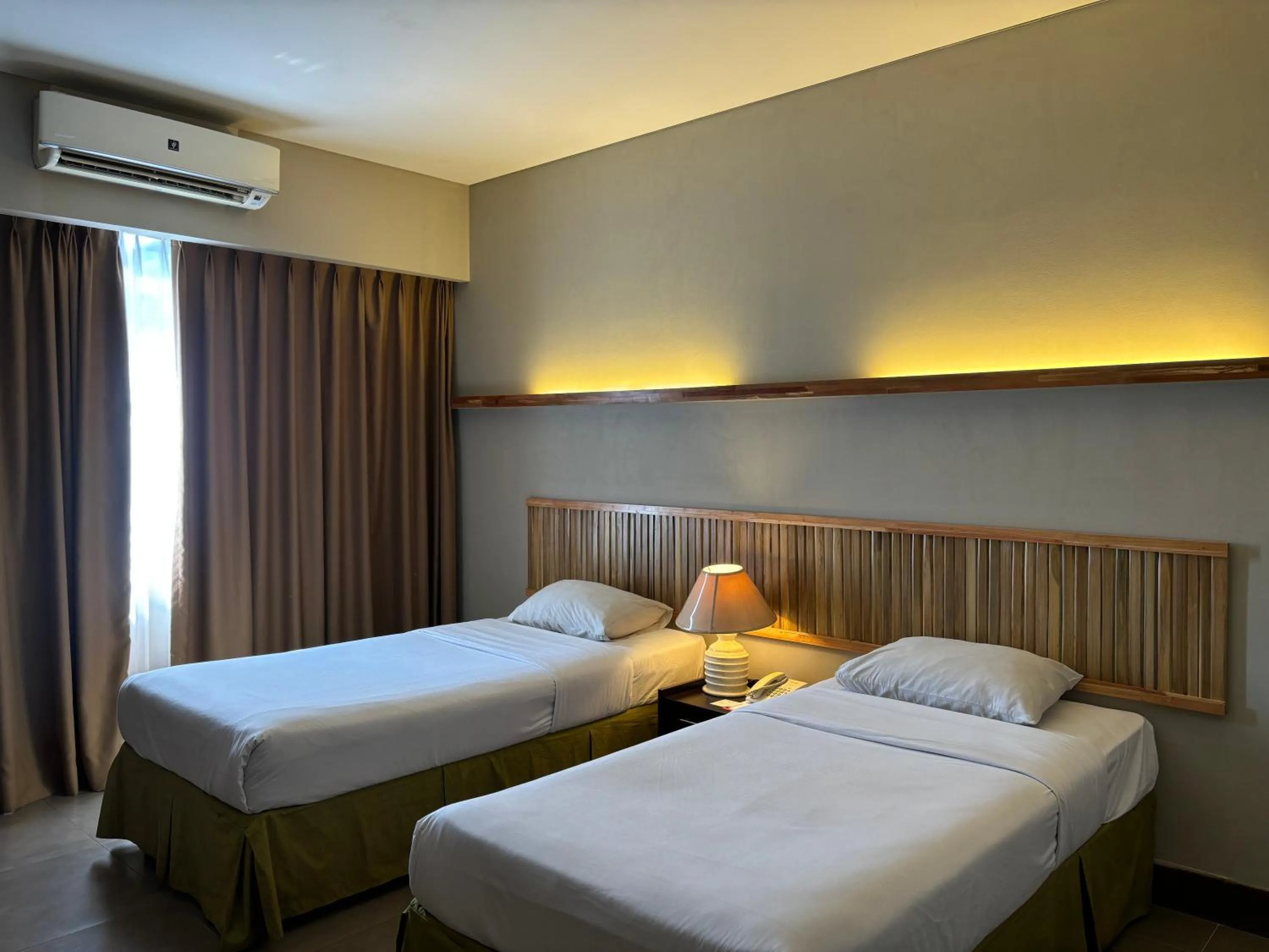 Bed in Bali World Hotel