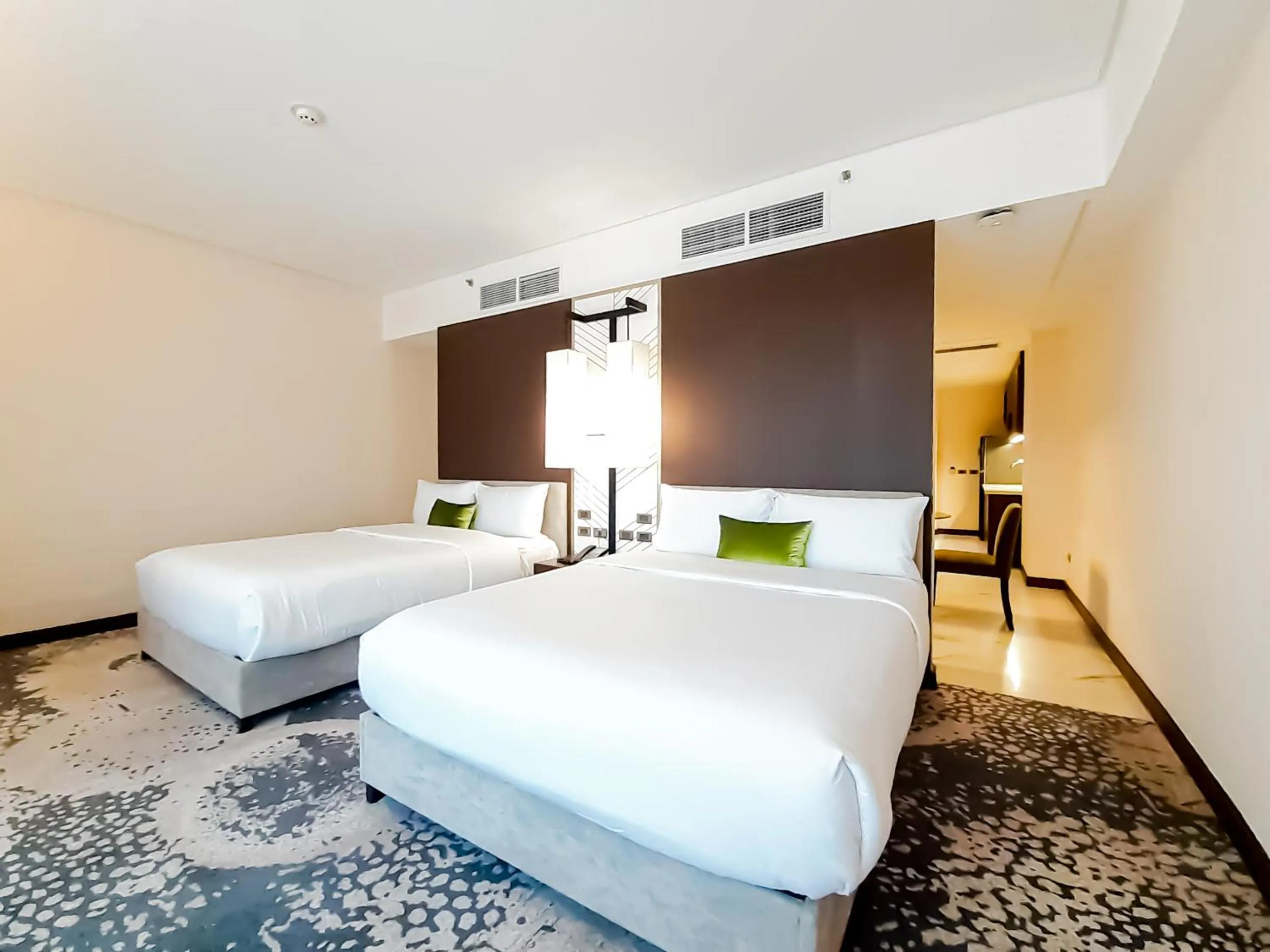 Bed in The Excelsior Hotel Las Piñas