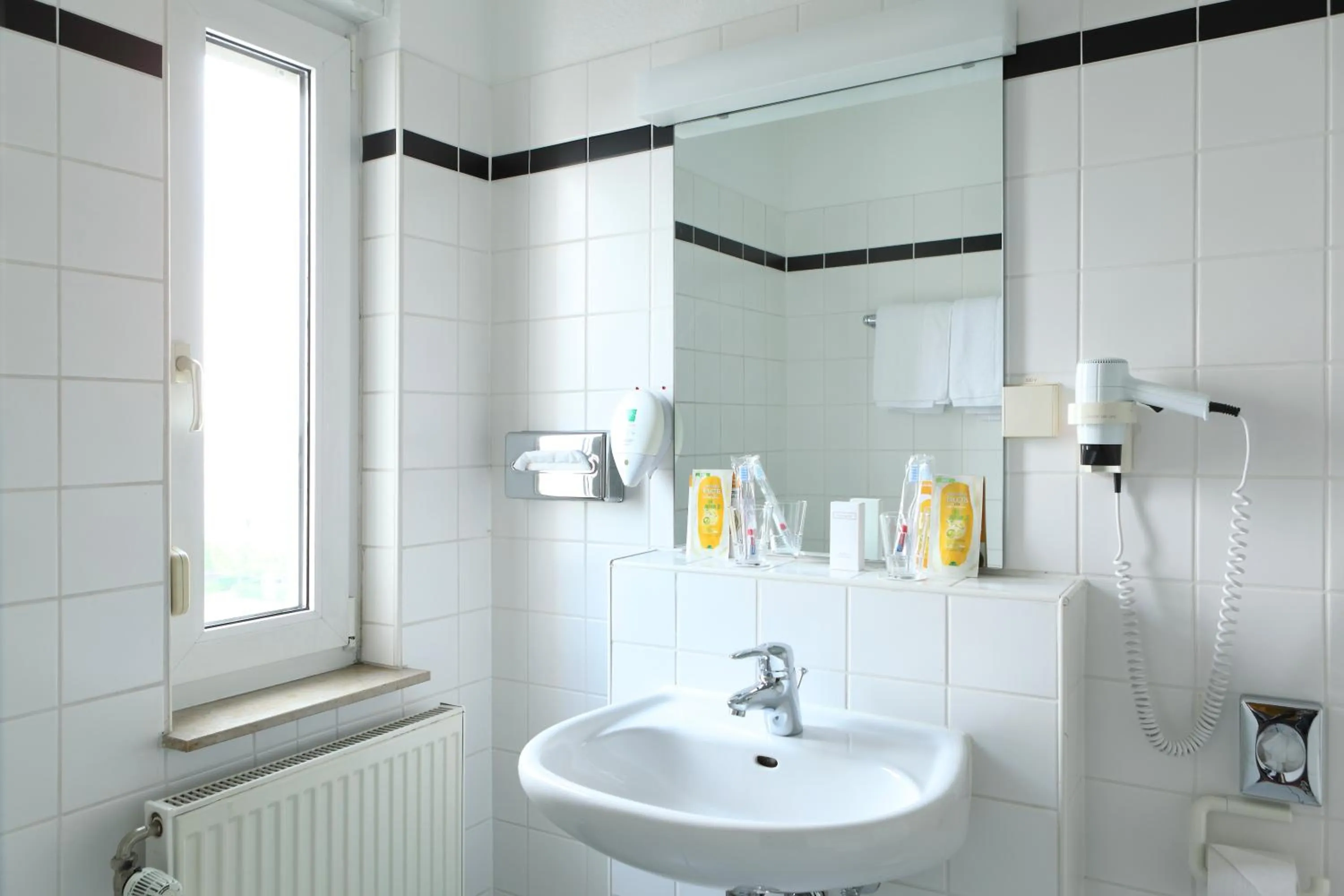 Bathroom in Tryp by Wyndham Bremen Airport