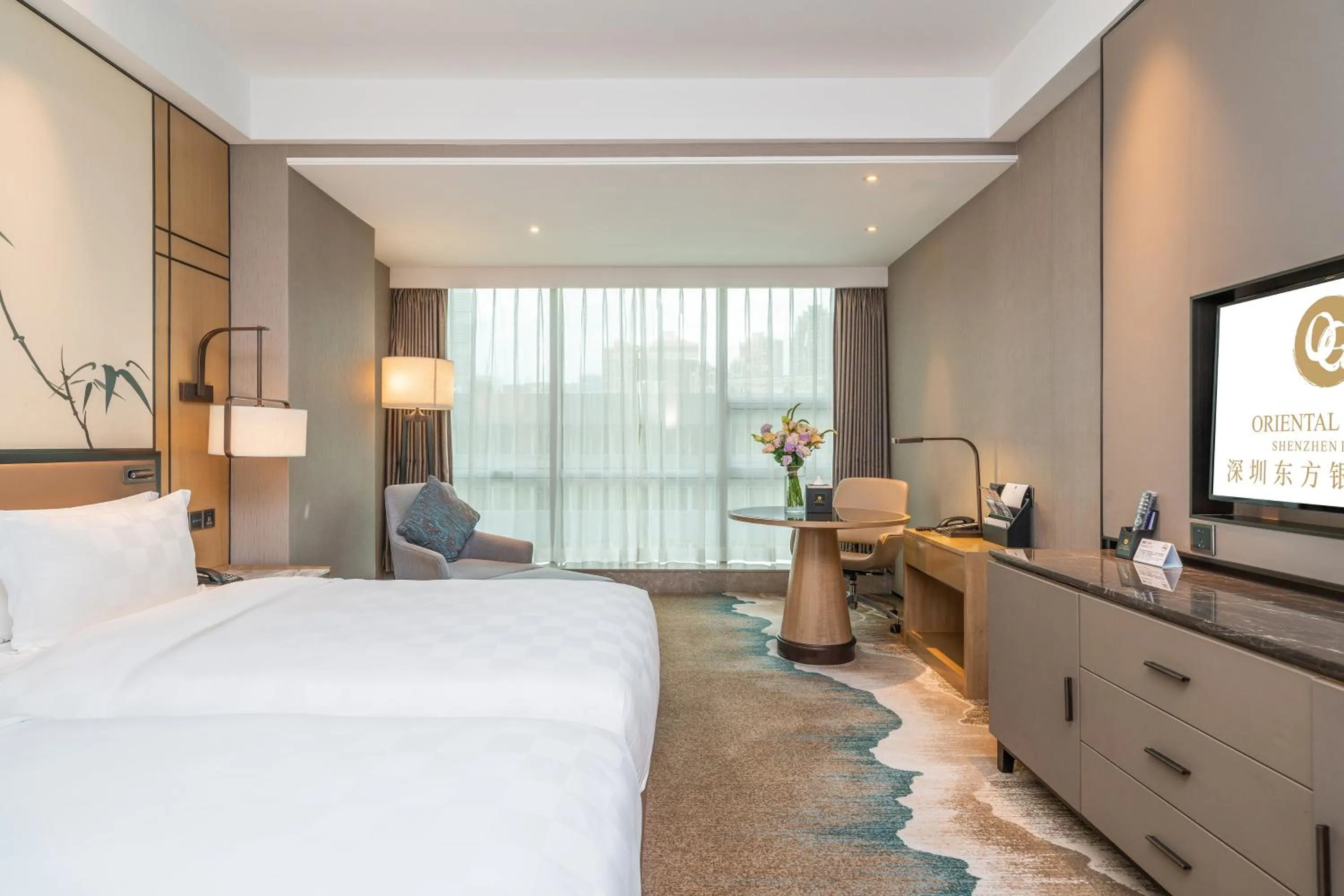 Bed in Oriental Ginza Hotel Shenzhen