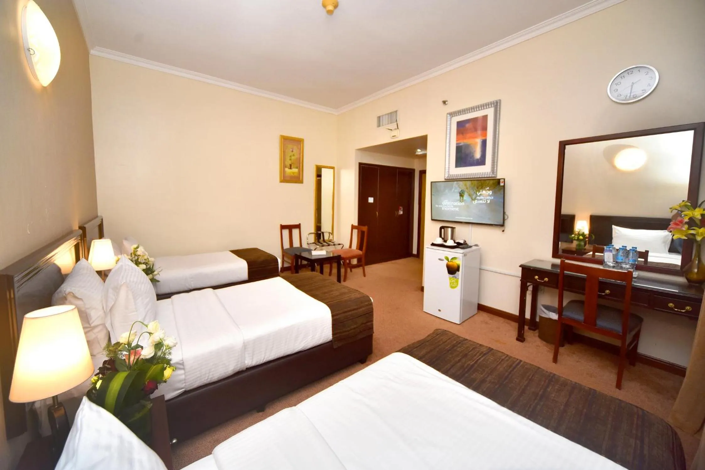 Photo of the whole room, Bed in Nejoum Al Emarat