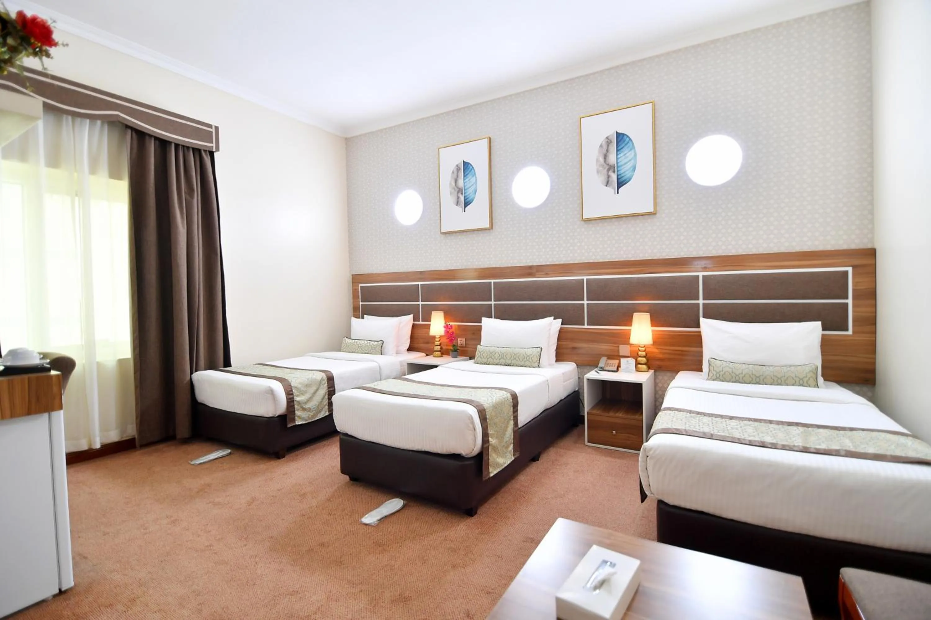 Photo of the whole room, Bed in Nejoum Al Emarat