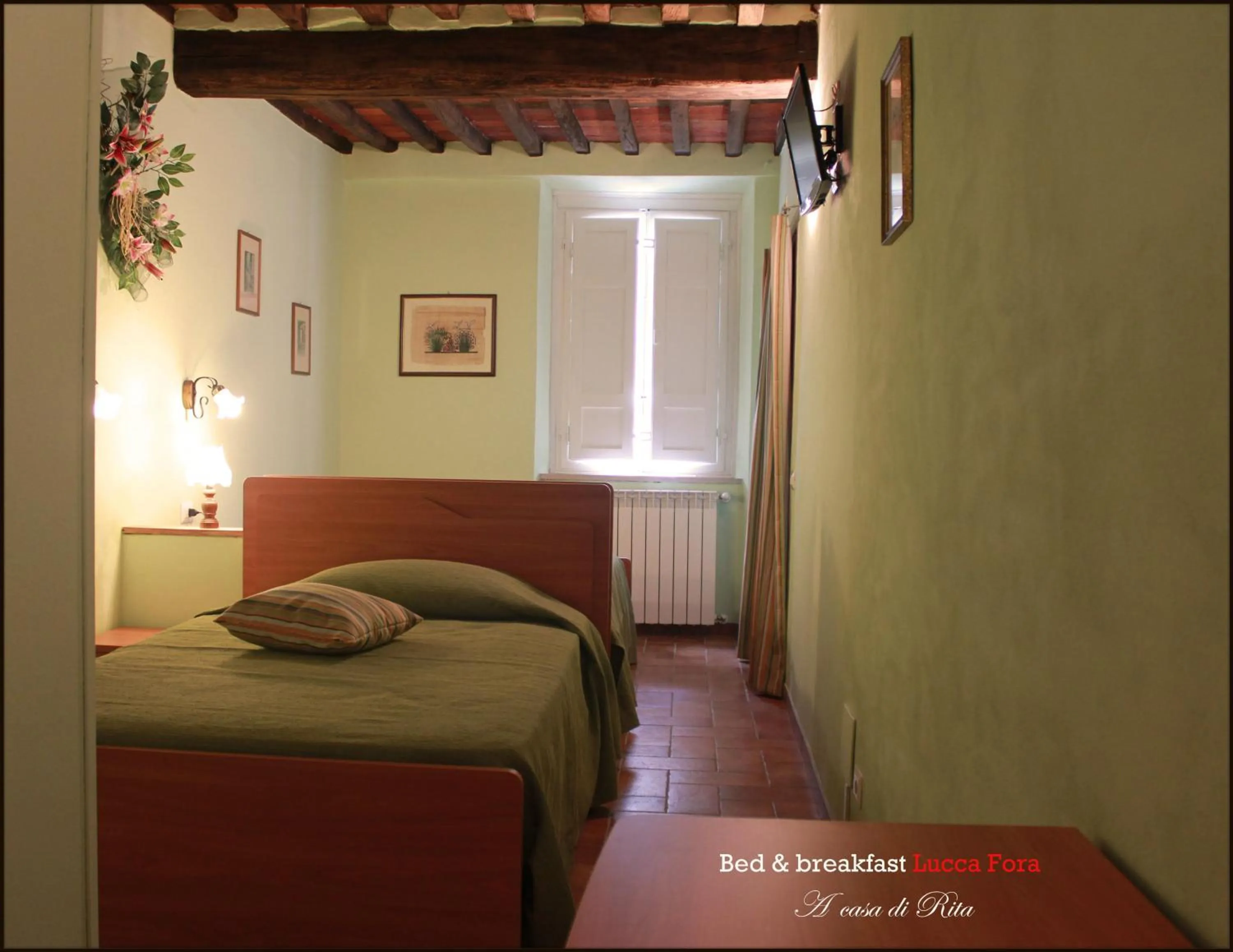 Bed in Bed & Breakfast Lucca Fora