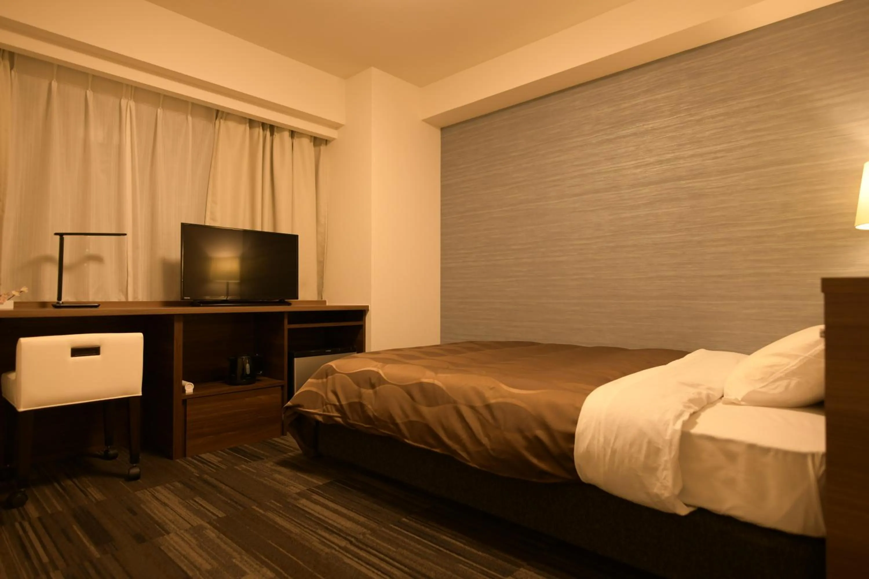 Photo of the whole room, Bed in Sakura Hotel Onomichi Ekimae